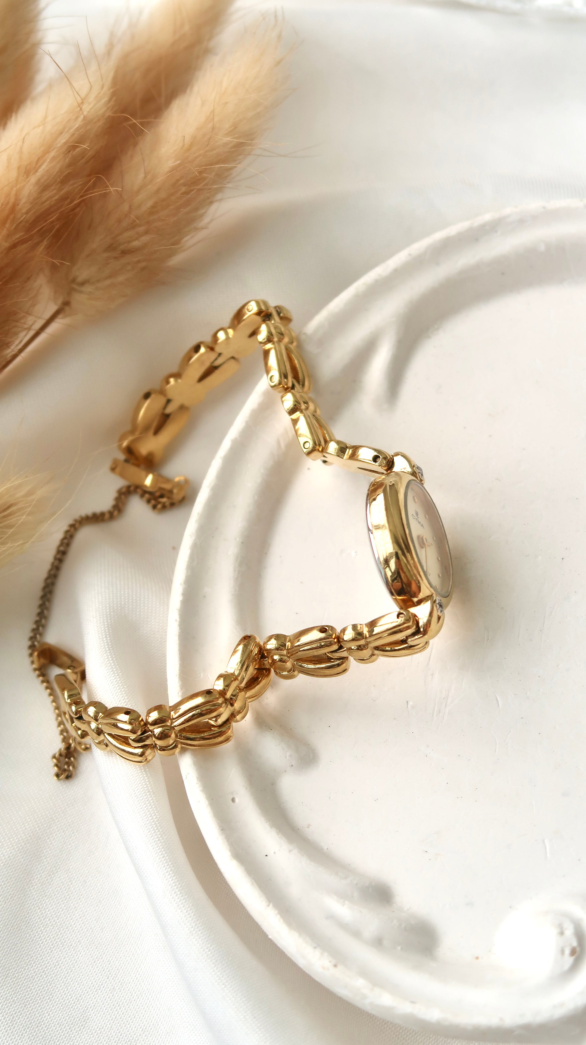 CY. Beige Oval 2P Diamond with Gold Chain Watch