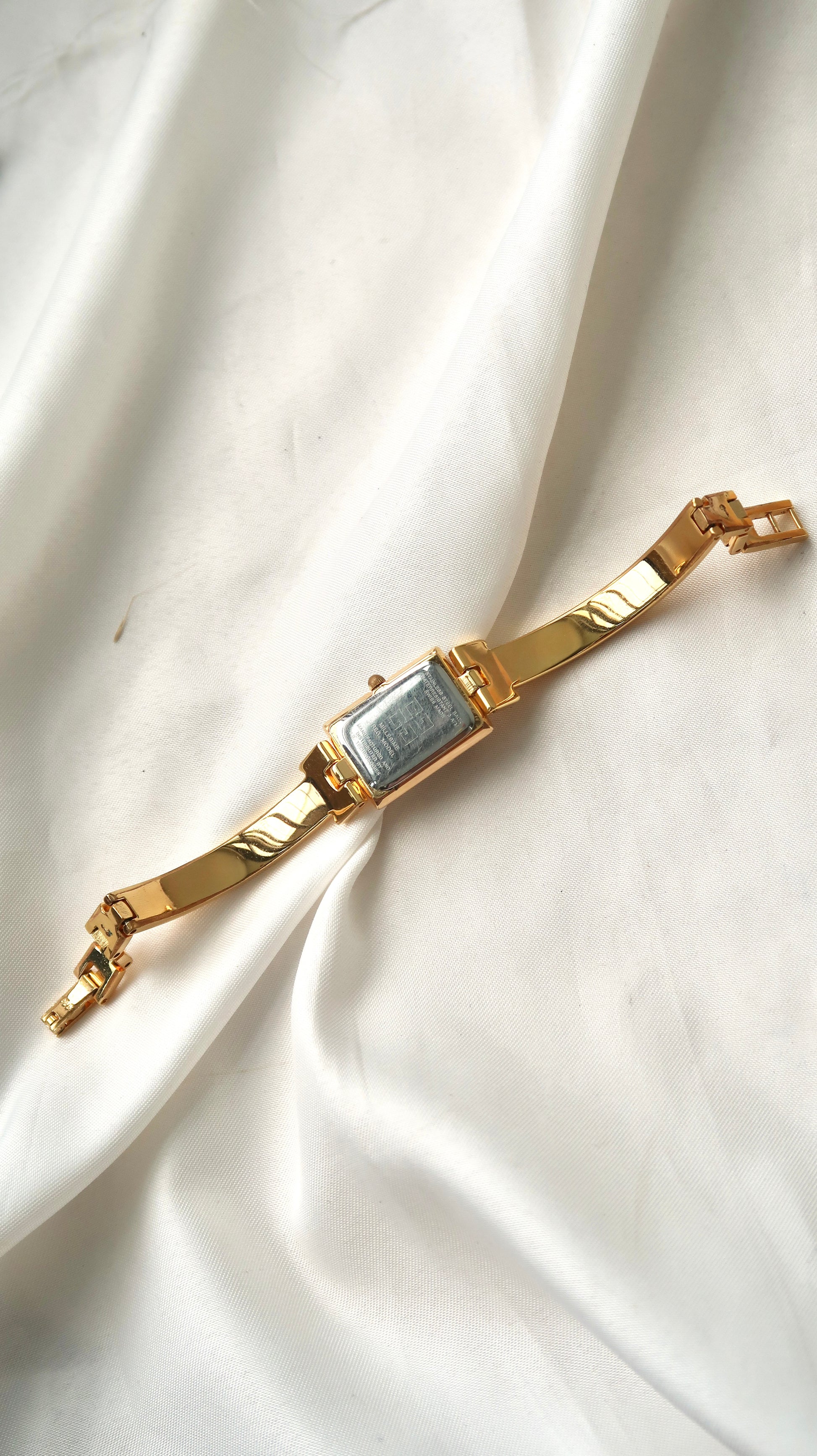 GV. Black Rect Dial with Gold Bangle Watch