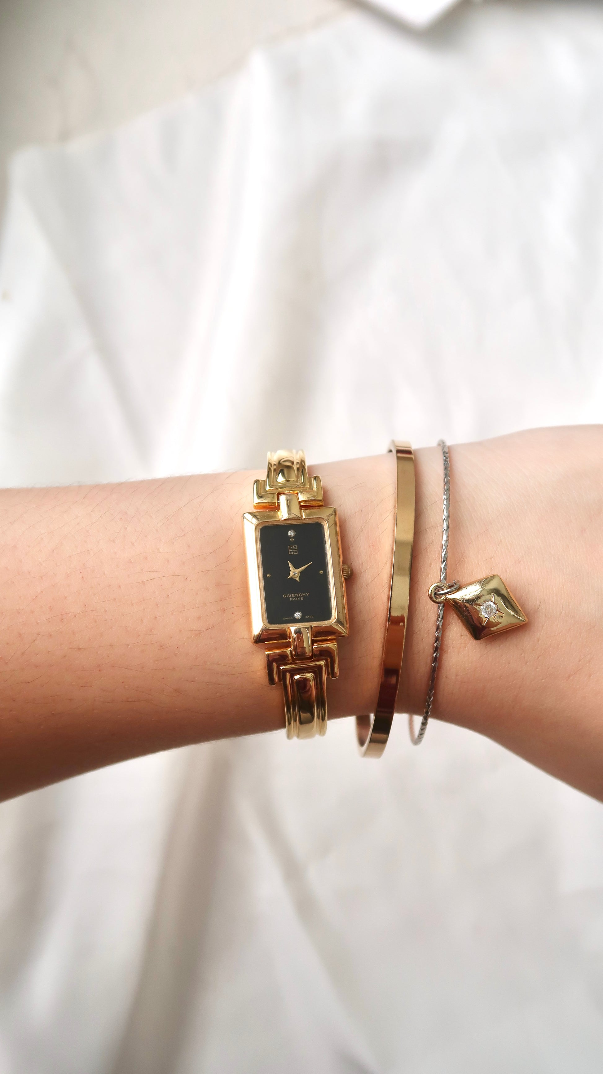 GV. Black Rect Dial with Gold Bangle Watch