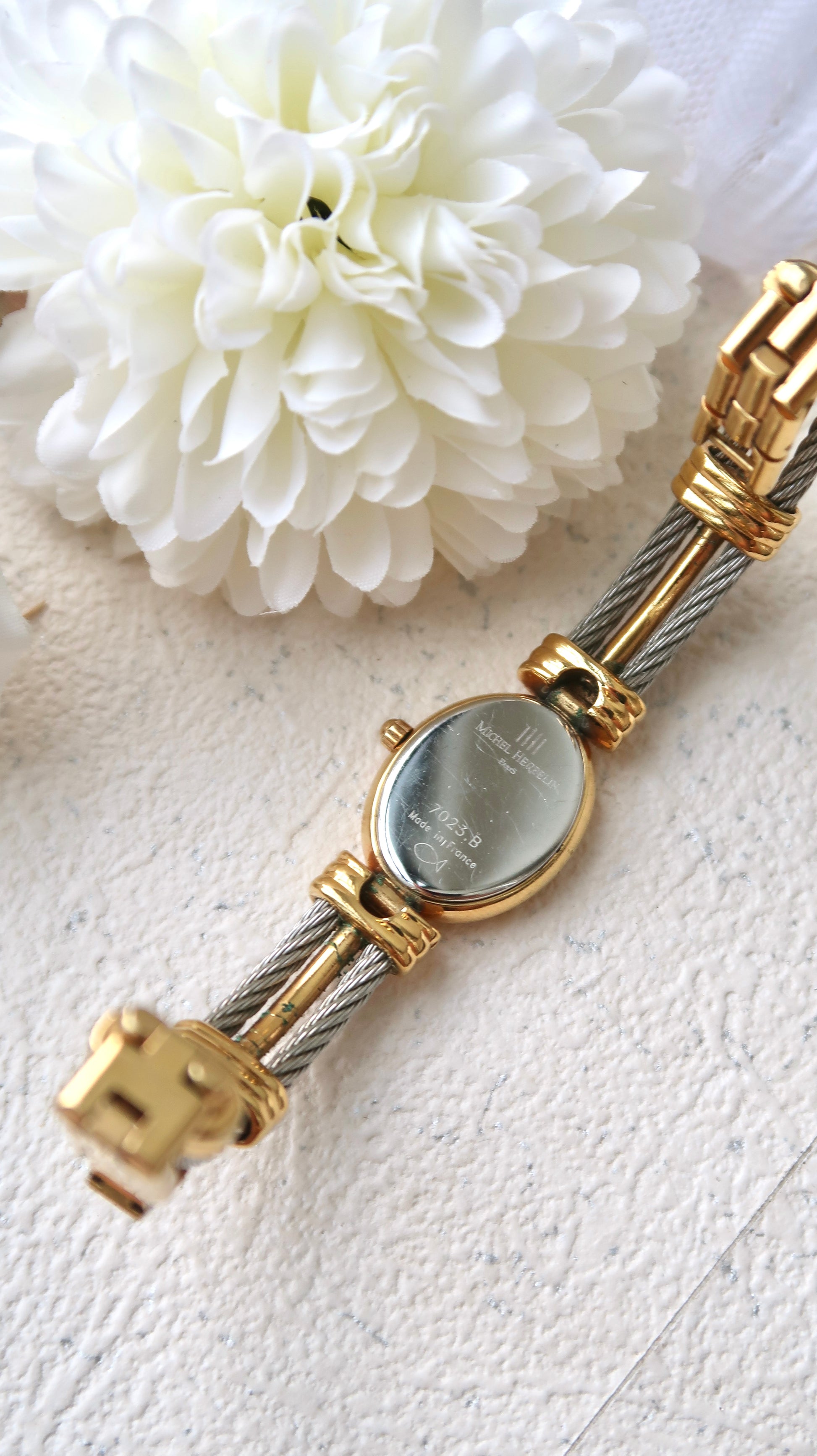 M. Herbelin White Oval Roman Dial with Two Tone Bangle Watch
