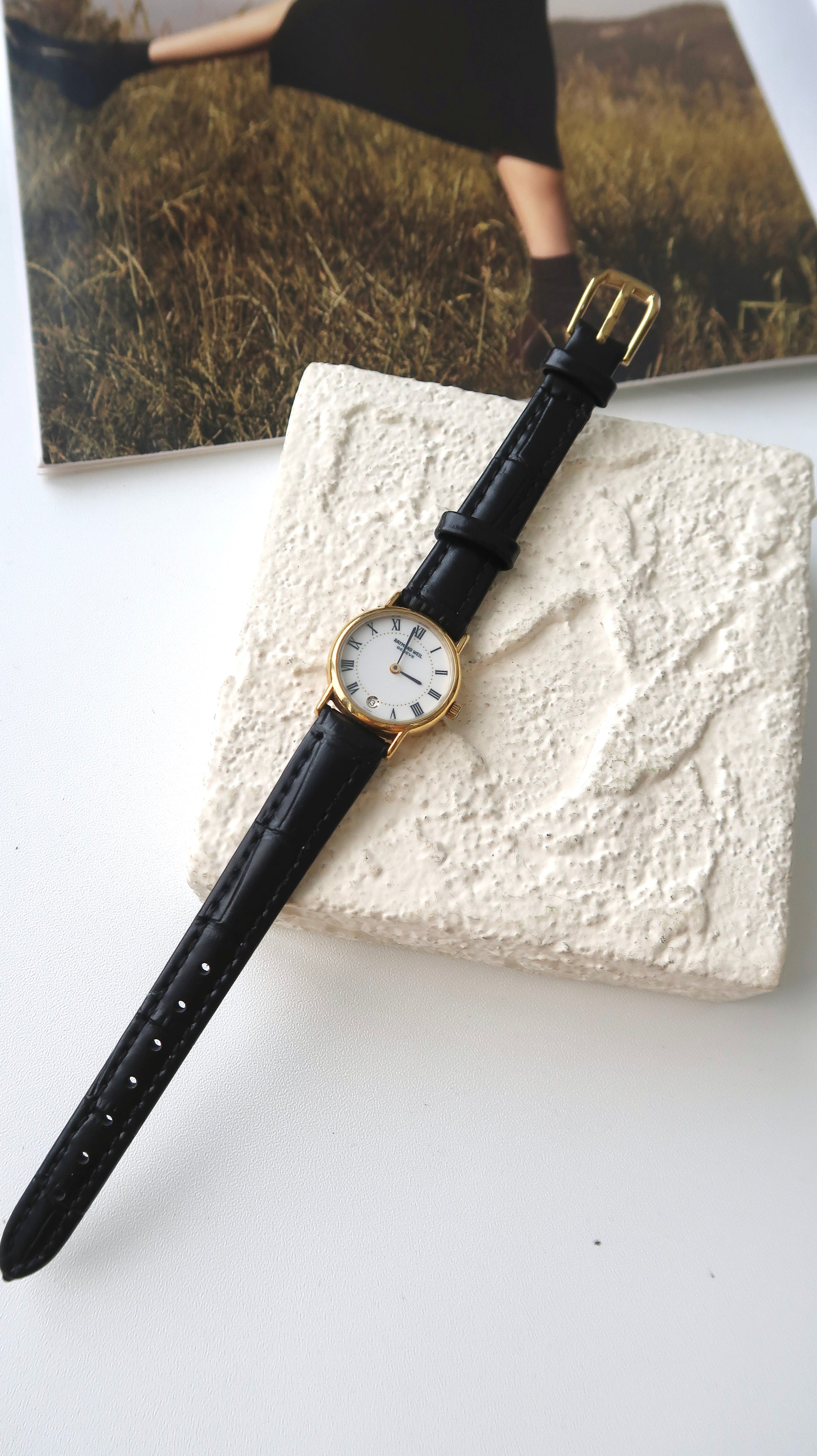 RW. Round White Roman Date Dial with Black Strap Watch
