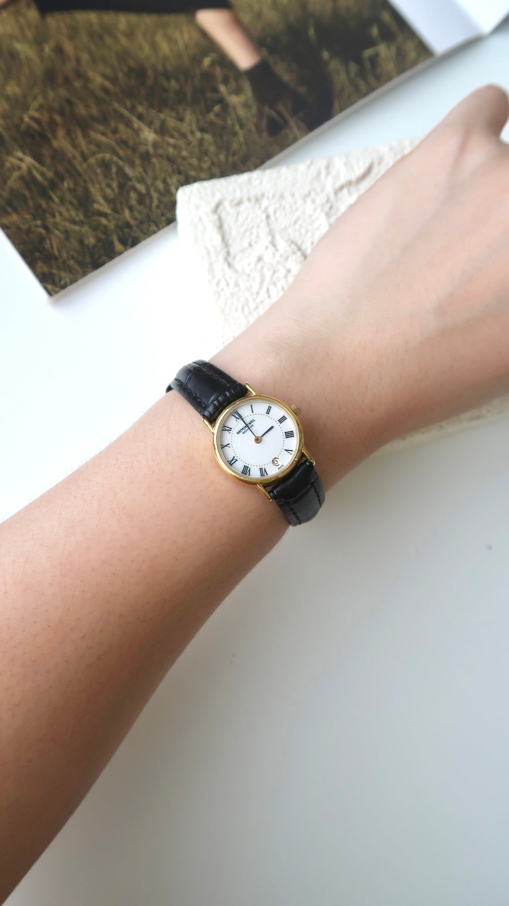 RW. Round White Roman Date Dial with Black Strap Watch