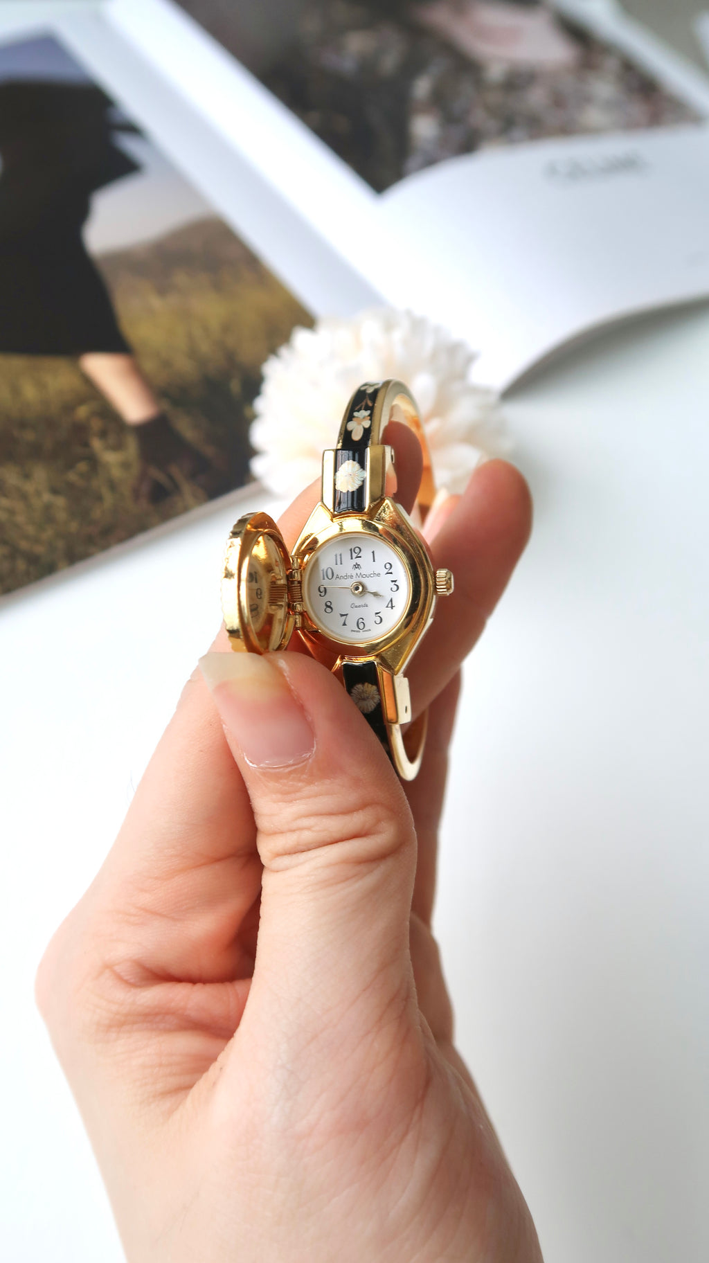AM. White Hibiscus Flower Black Pattern Gold Bangle Watch