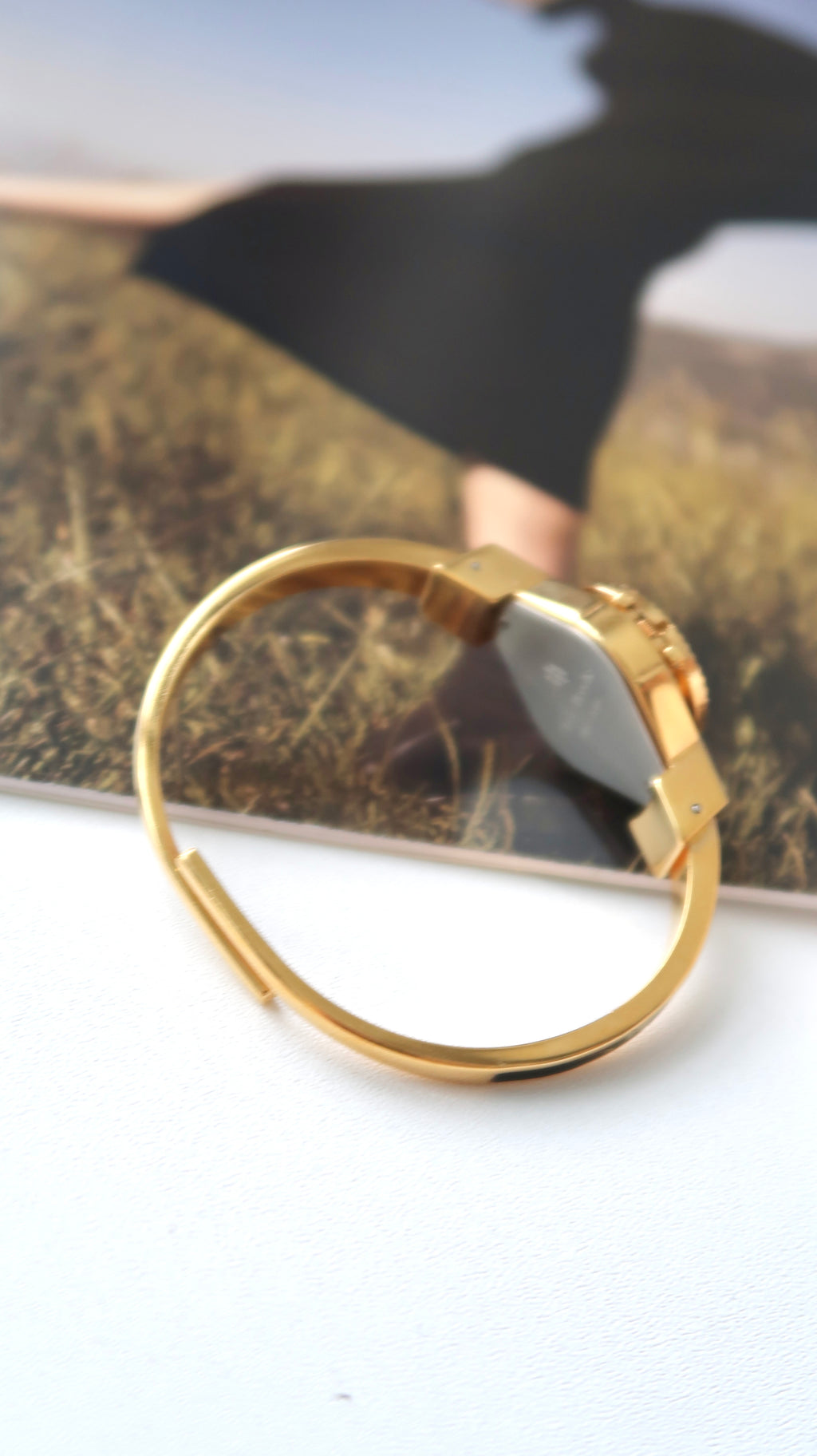 AM. White Hibiscus Flower Black Pattern Gold Bangle Watch