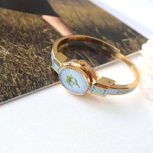 AM. White Jasmine Blue Pattern Gold Bangle Watch