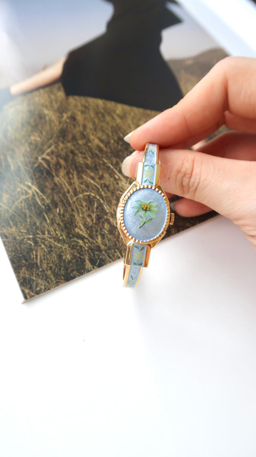 AM. White Jasmine Blue Pattern Gold Bangle Watch