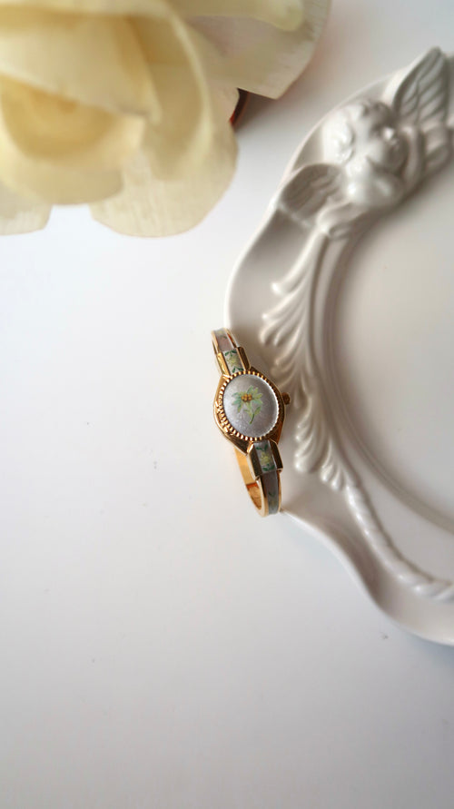 AM. Silver & Green Flower Dial Gold Bangle Watch