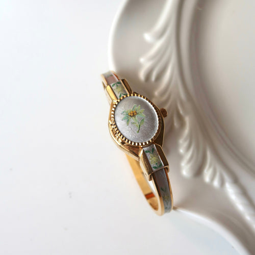 AM. Silver & Green Flower Dial Gold Bangle Watch