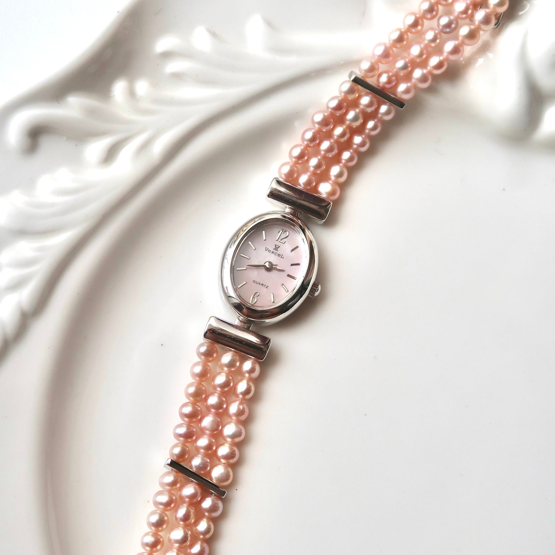Vx. Pink MOP Oval Dial Pink Pearls Silver Chain Watch