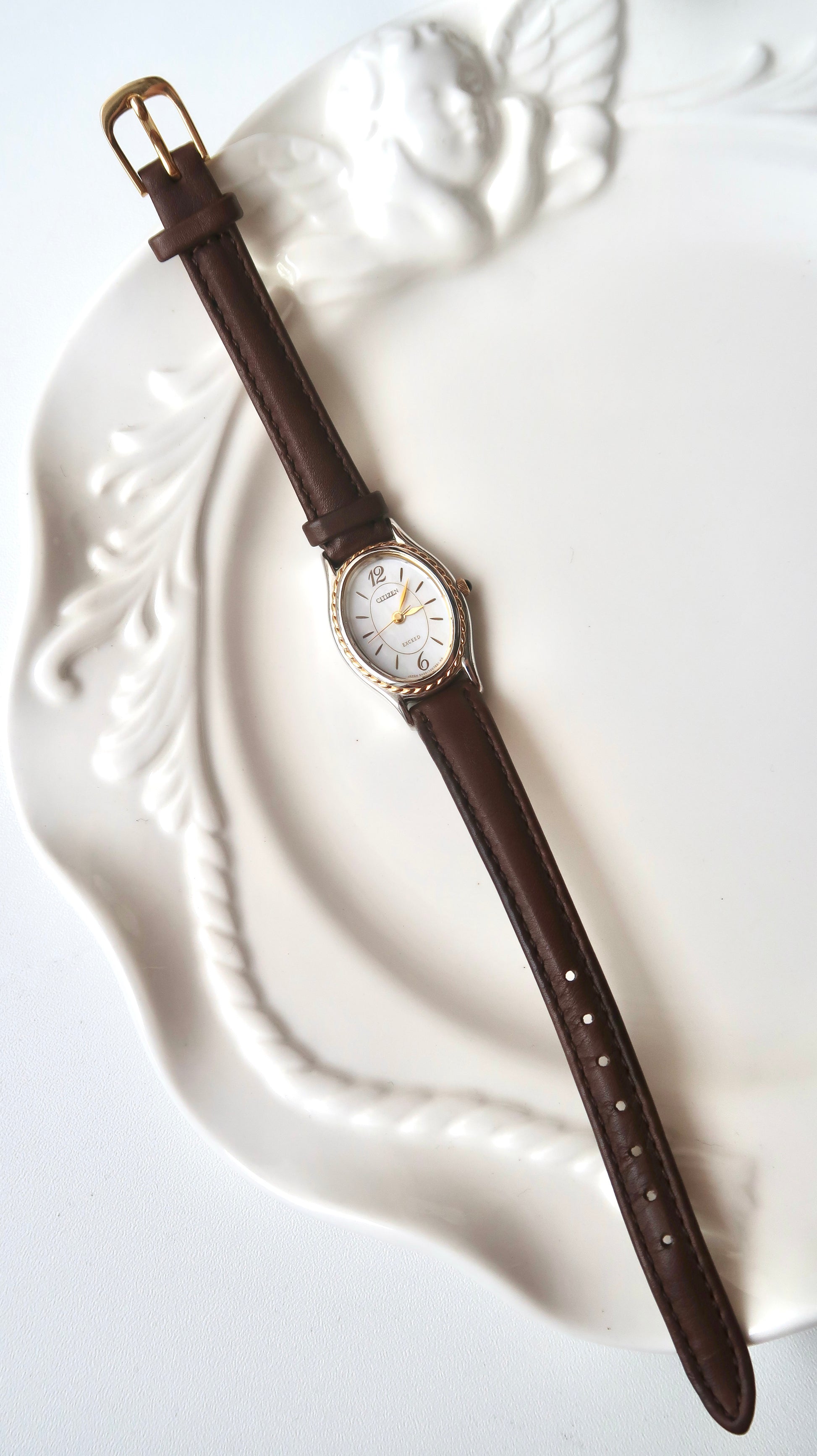 CTZ. Exceed MOP Oval Dial Dark Brown Strap Watch
