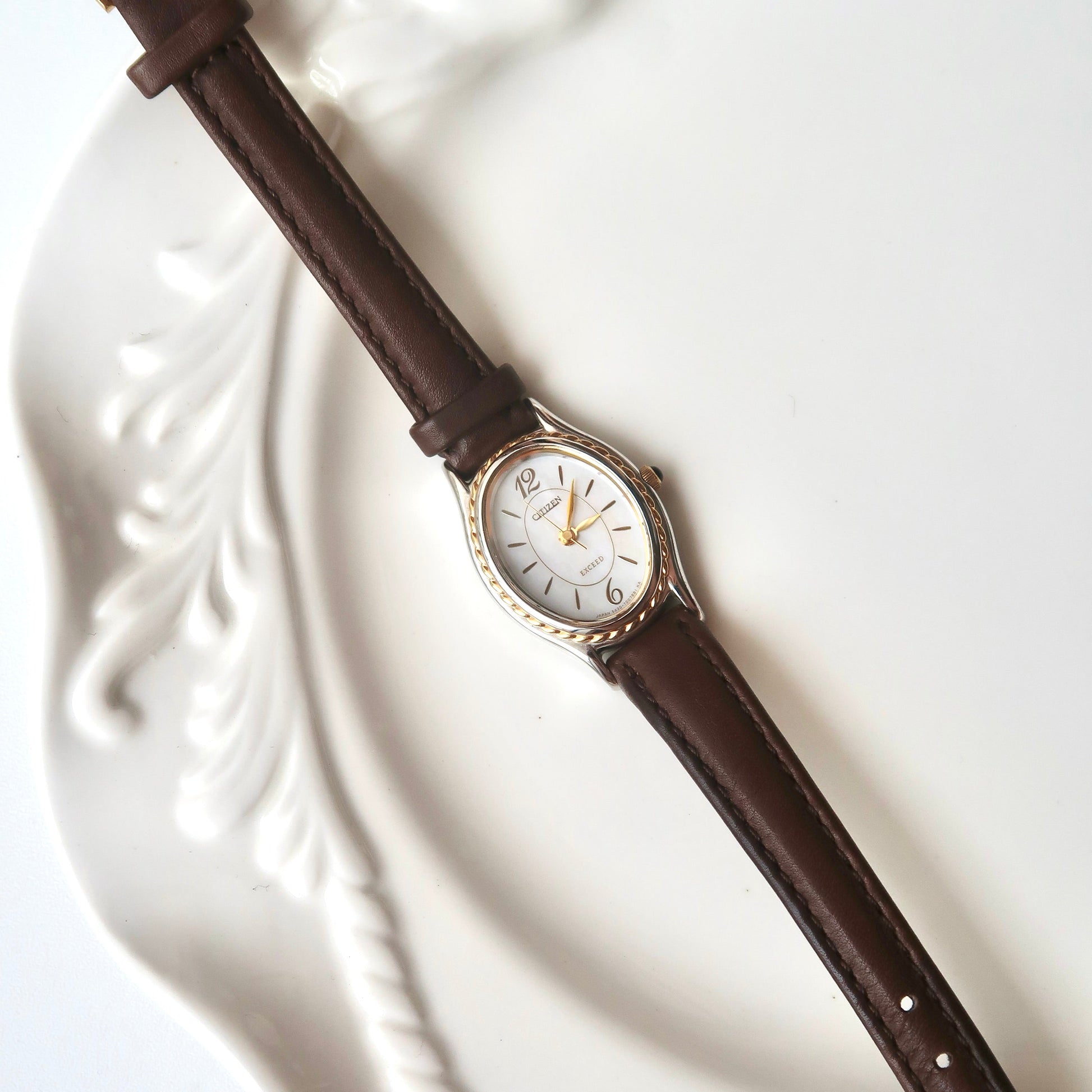 CTZ. Exceed MOP Oval Dial Dark Brown Strap Watch