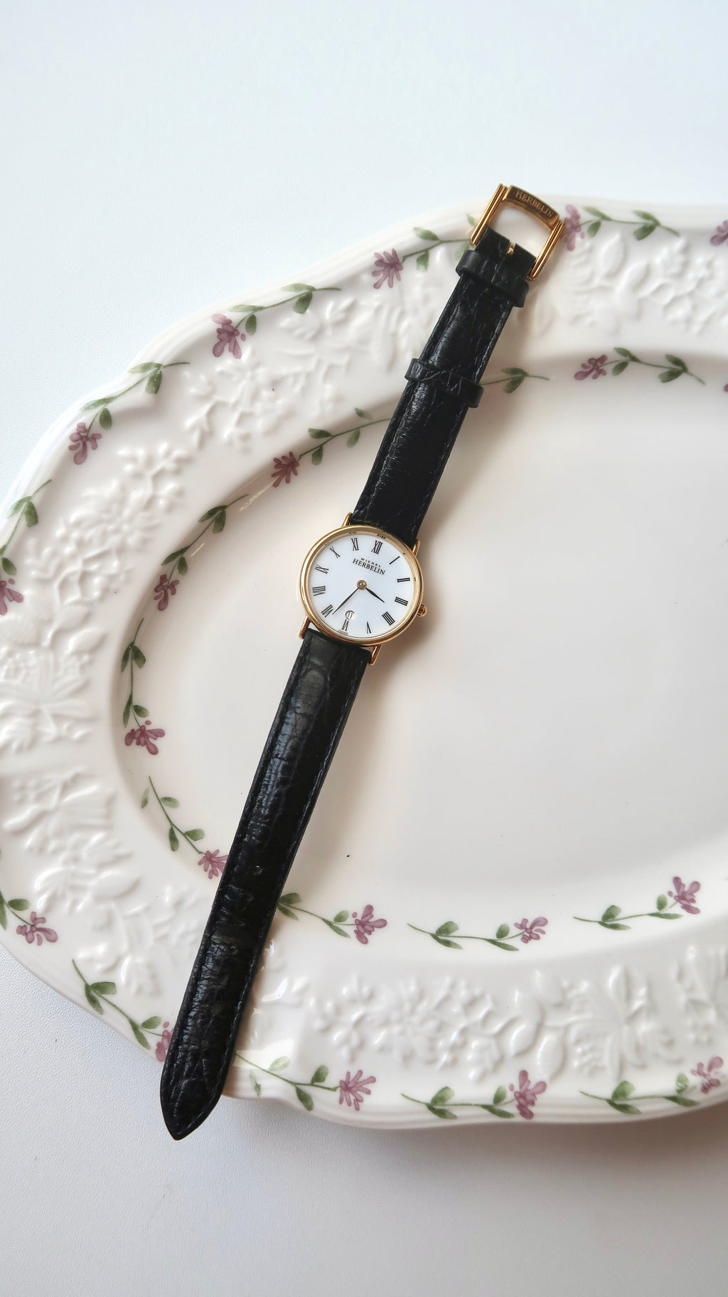 M. Herbelin White Roman Date Round Dial Black Strap Watch