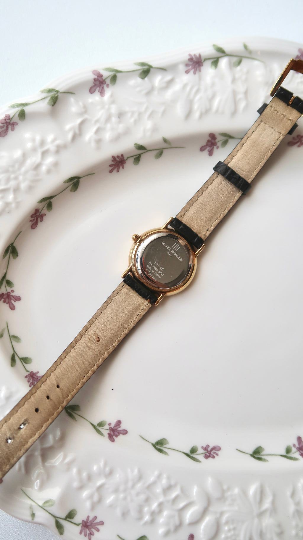M. Herbelin White Roman Date Round Dial Black Strap Watch