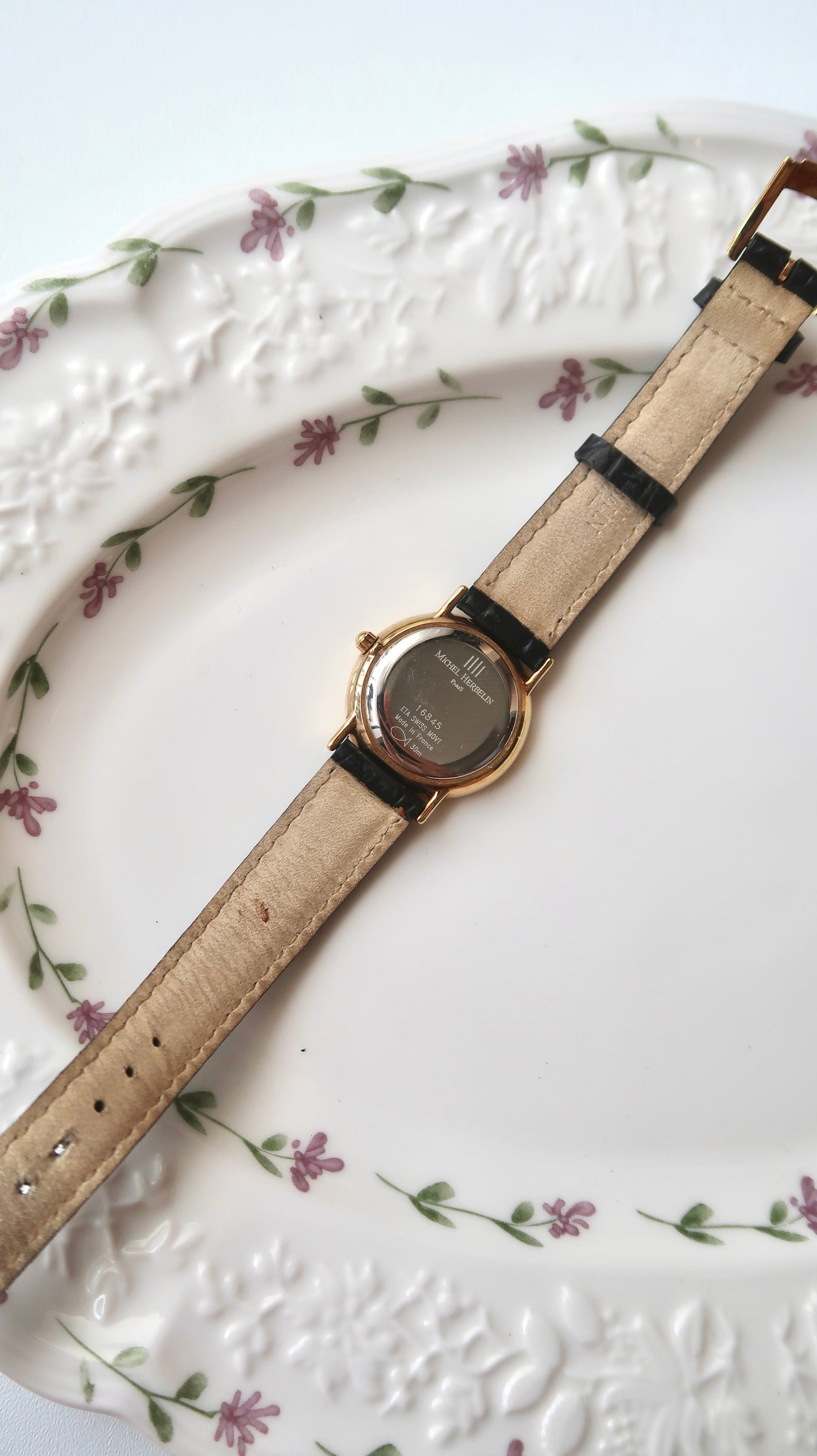 M. Herbelin White Roman Date Round Dial Black Strap Watch
