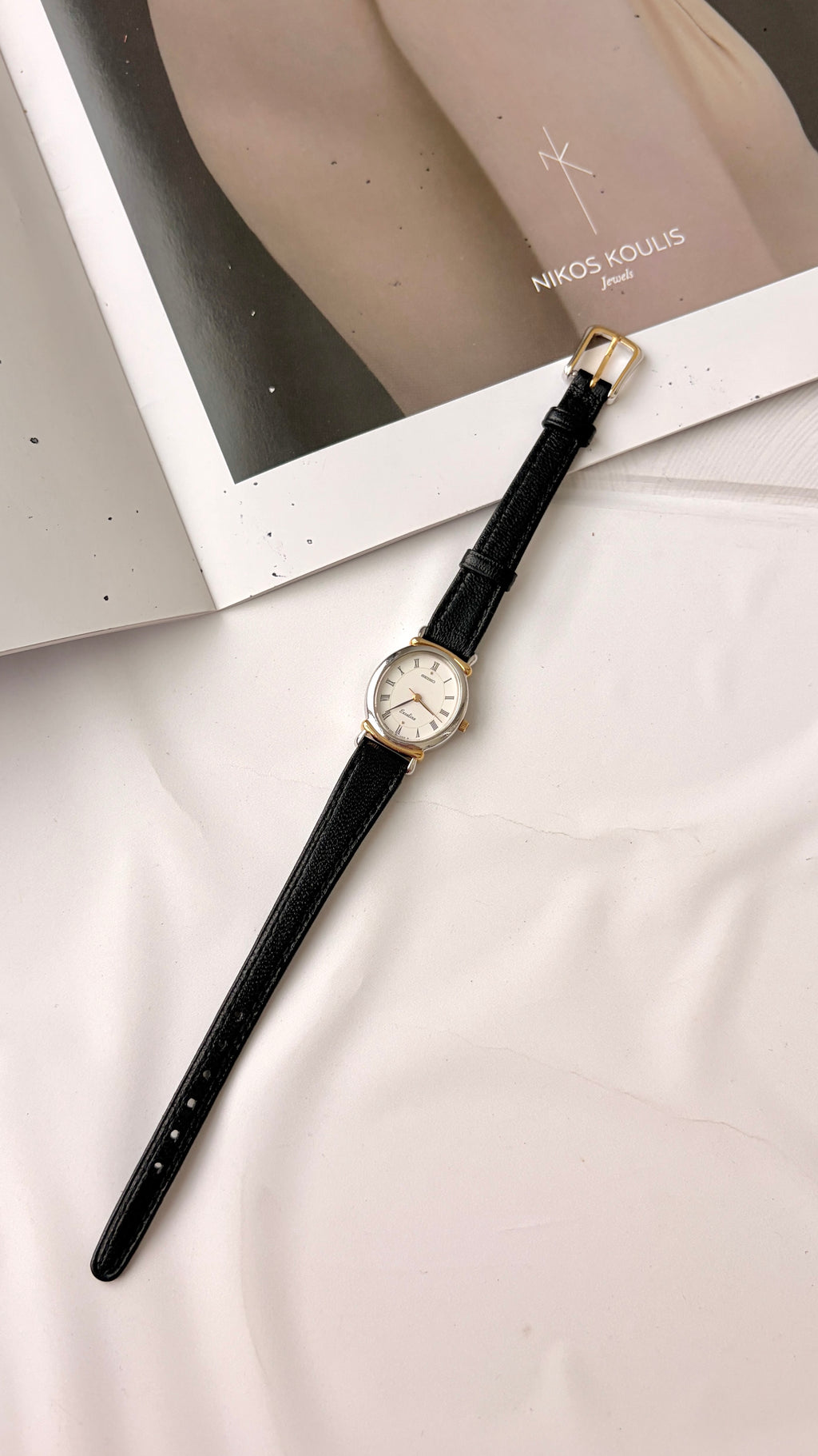 S. Exceline White Oval Roman Dial with Black Strap Watch