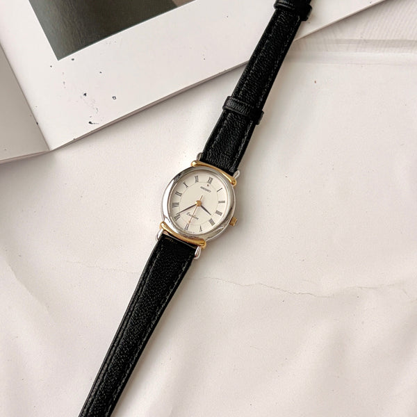 S. Exceline White Oval Roman Dial with Black Strap Watch