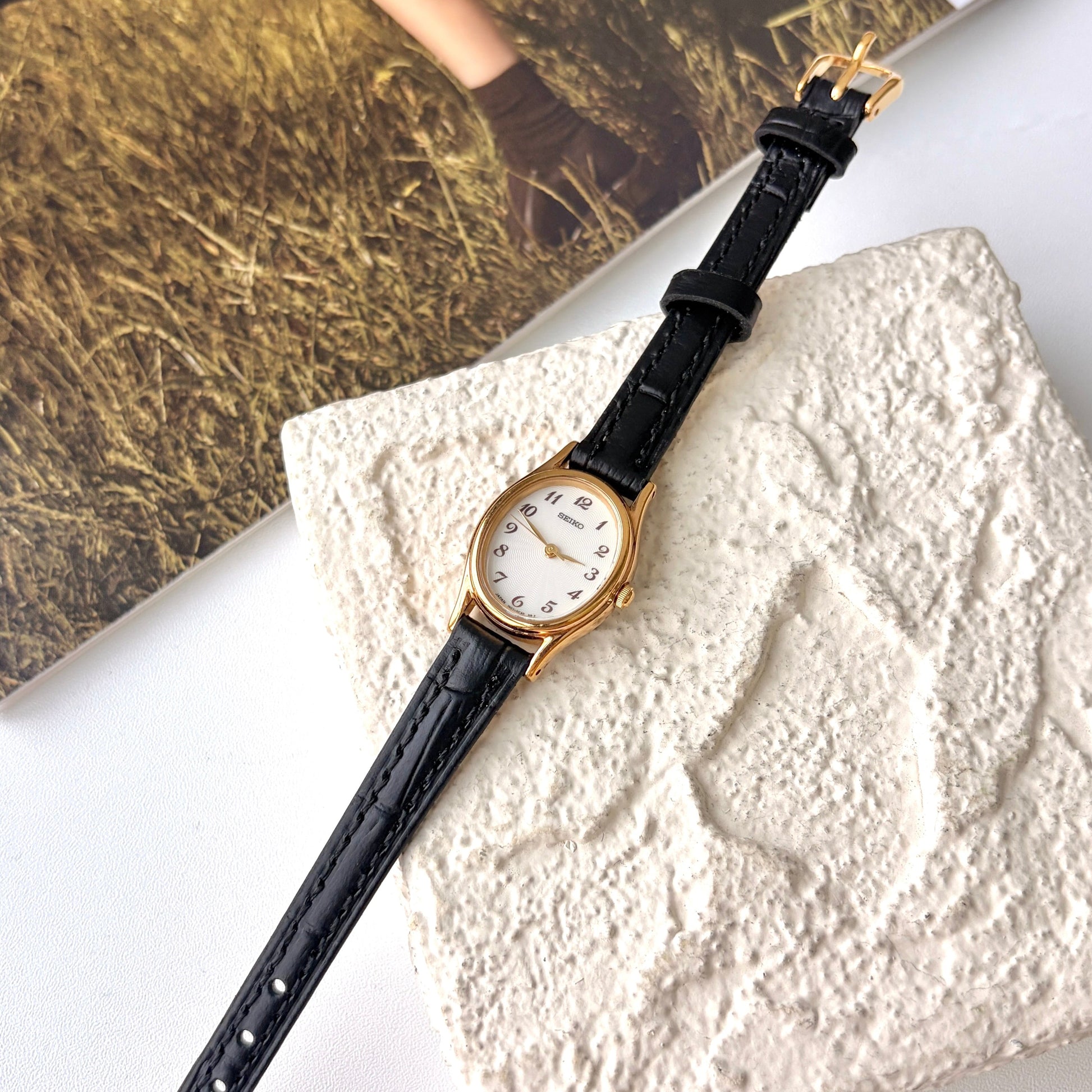 S. Oval White Dial with Black Strap Watch