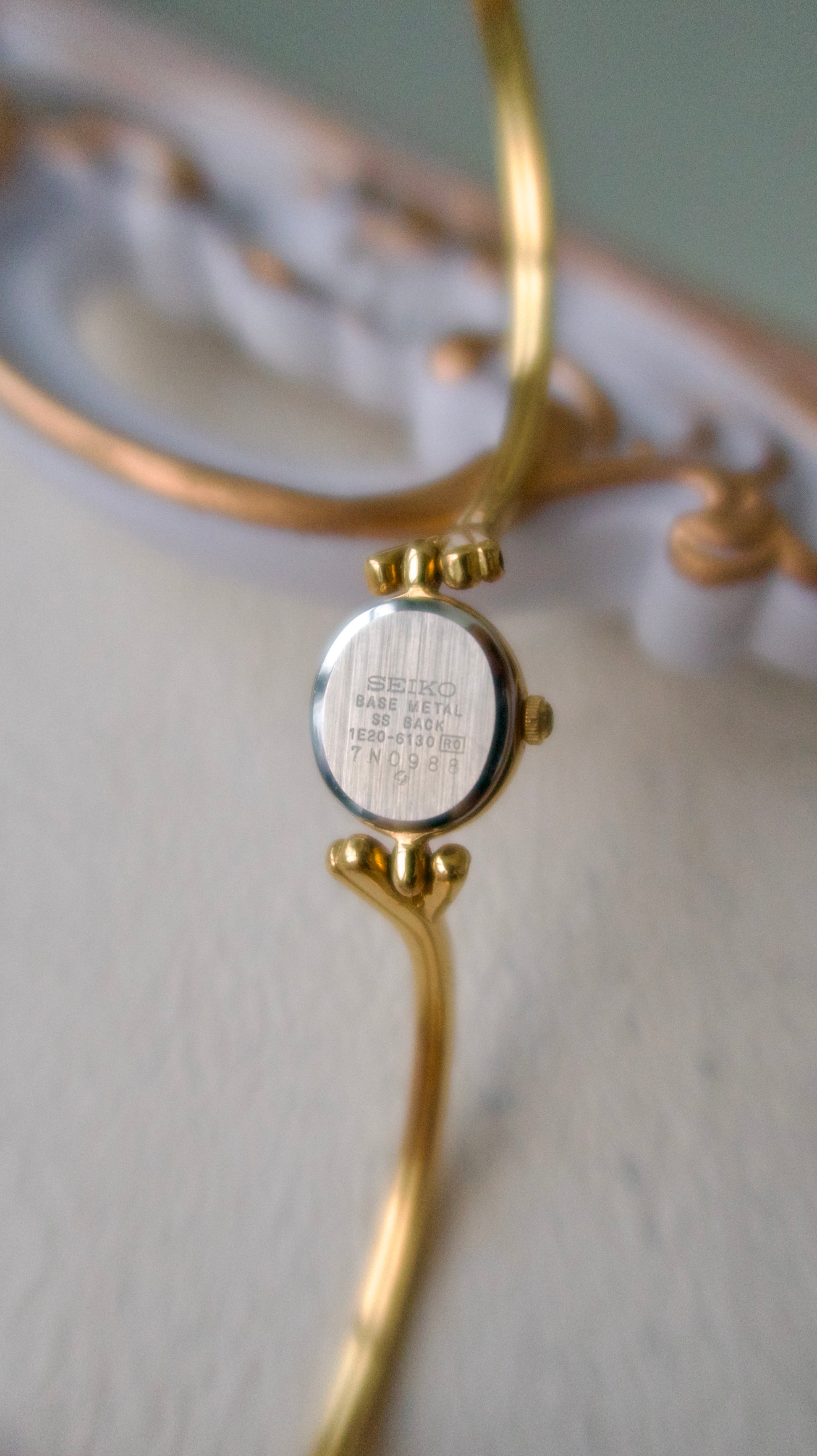 S. Round Gold Dial with Gold Bangle Bracelet