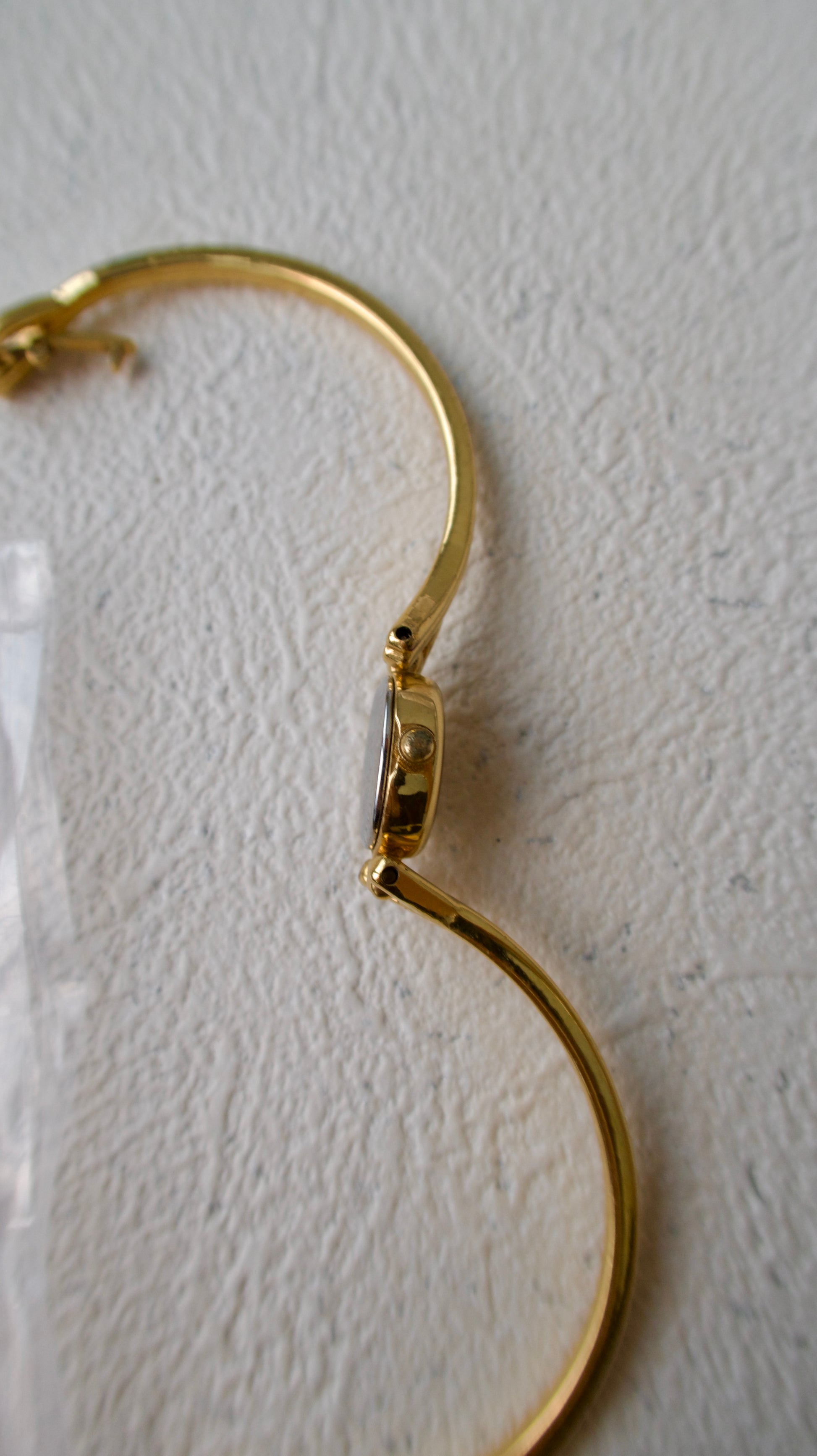 S. Round Gold Dial with Gold Bangle Bracelet