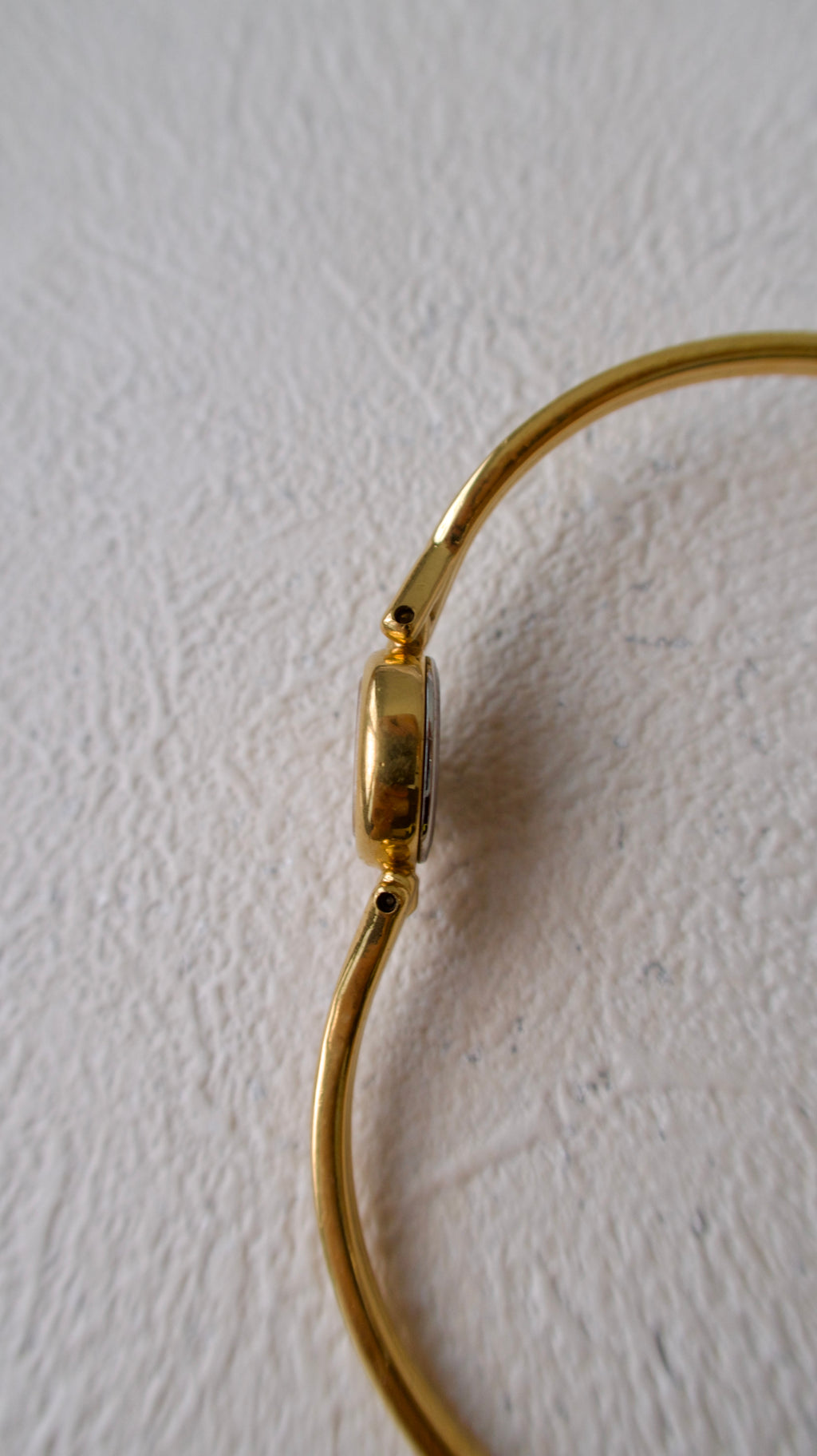 S. Round Gold Dial with Gold Bangle Bracelet