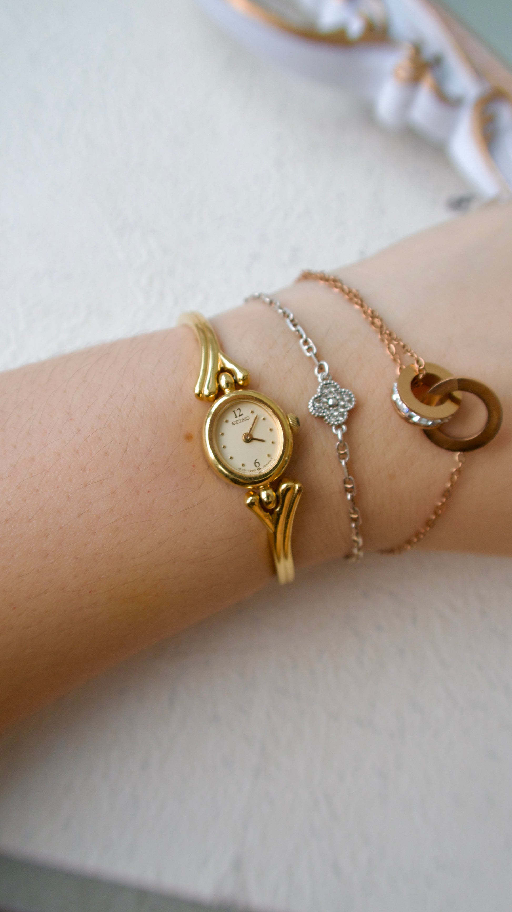 S. Round Gold Dial with Gold Bangle Bracelet