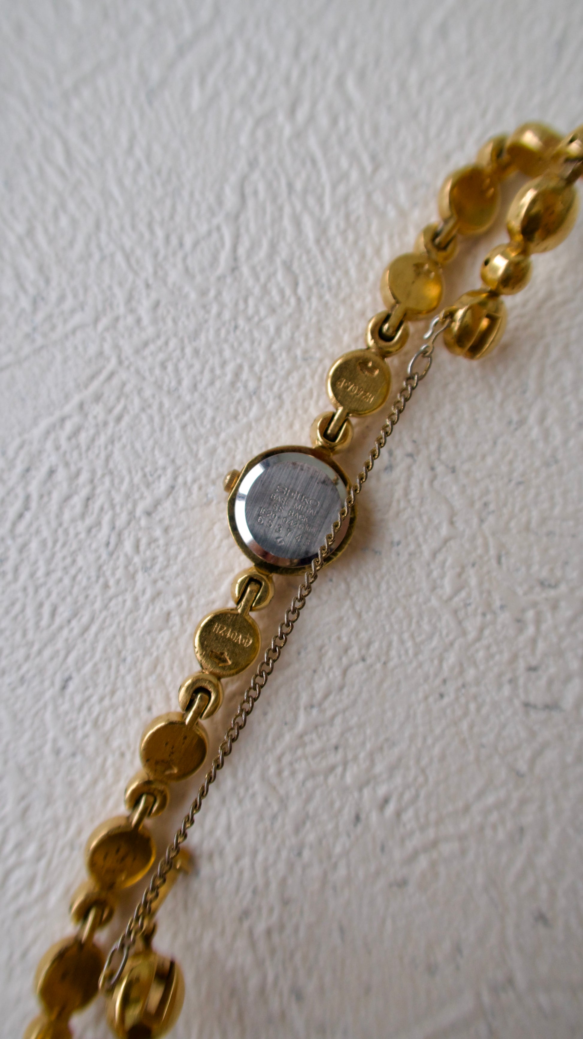 S. Round Gold Dial with Rubies, Beaded Chain