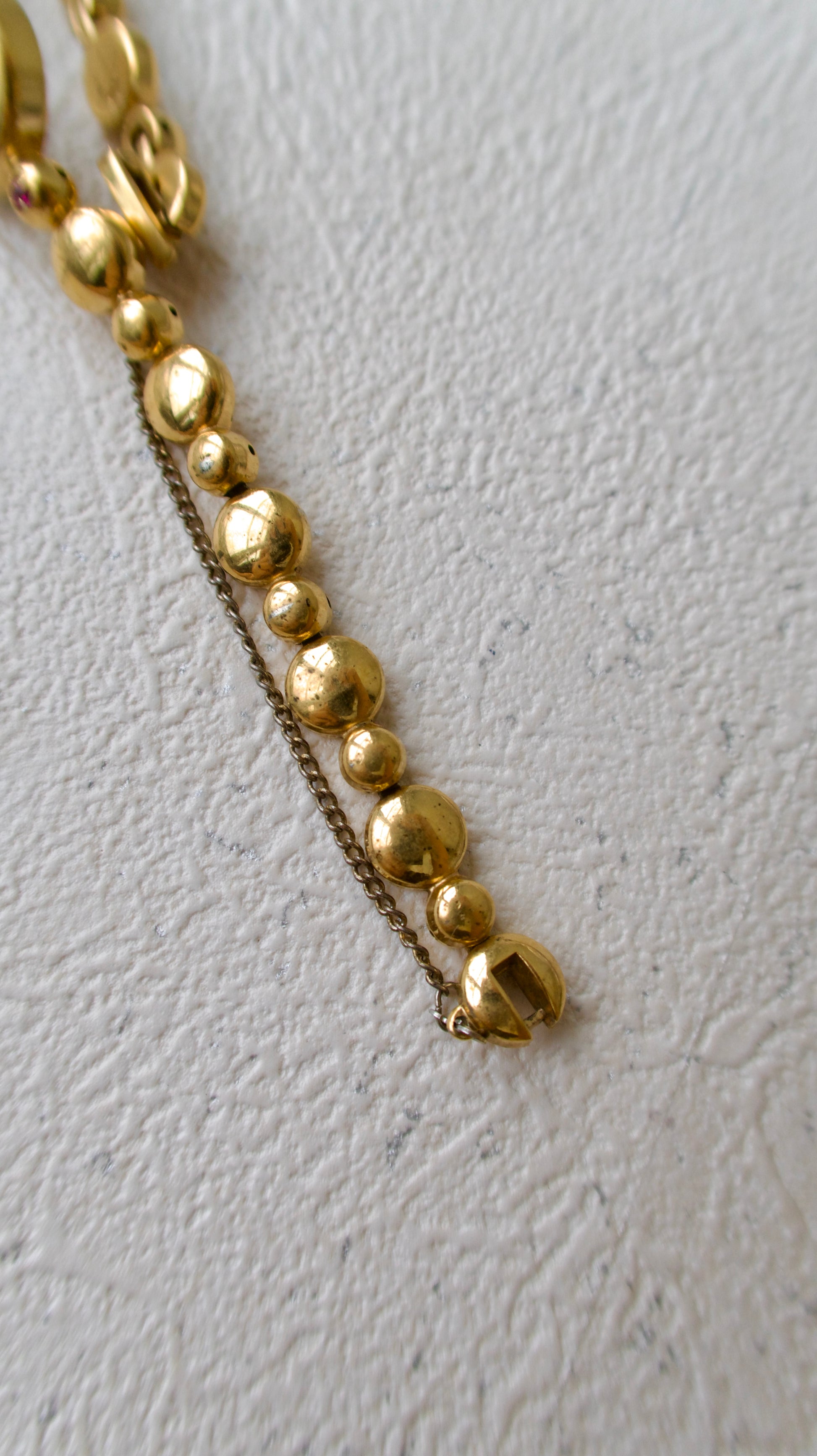 S. Round Gold Dial with Rubies, Beaded Chain