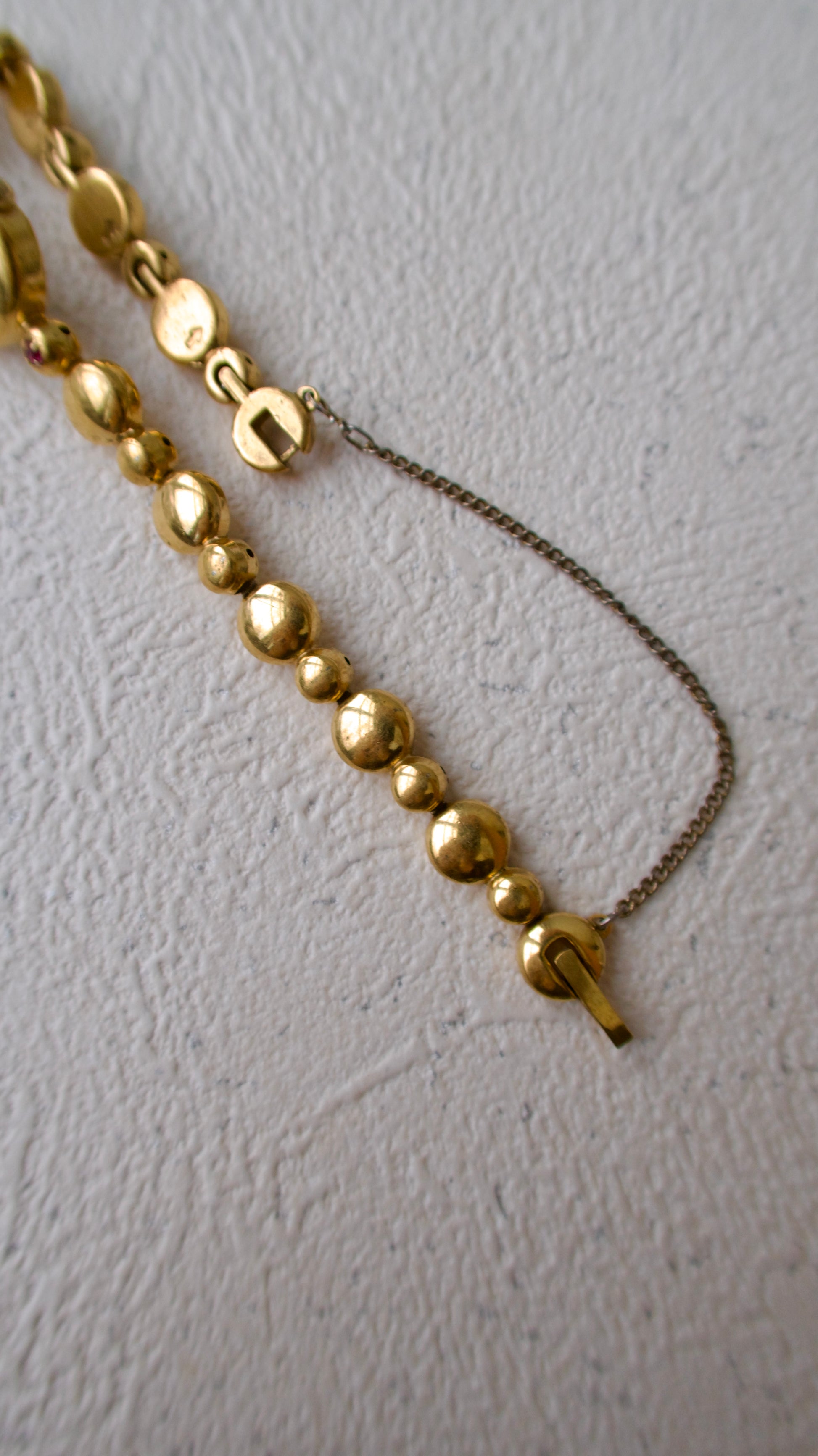 S. Round Gold Dial with Rubies, Beaded Chain