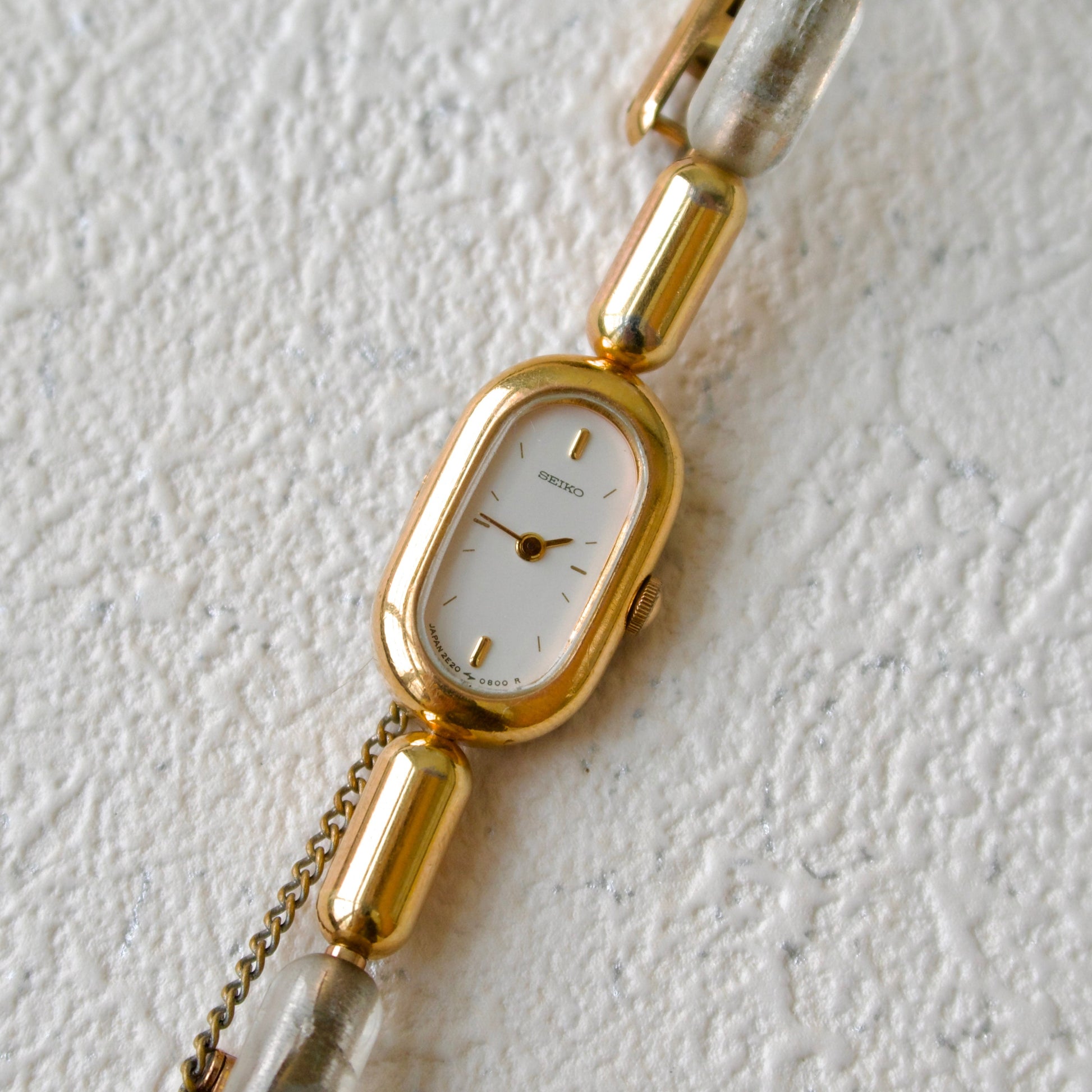 S. Oval White Dial with Gold Chain & Clear Beads