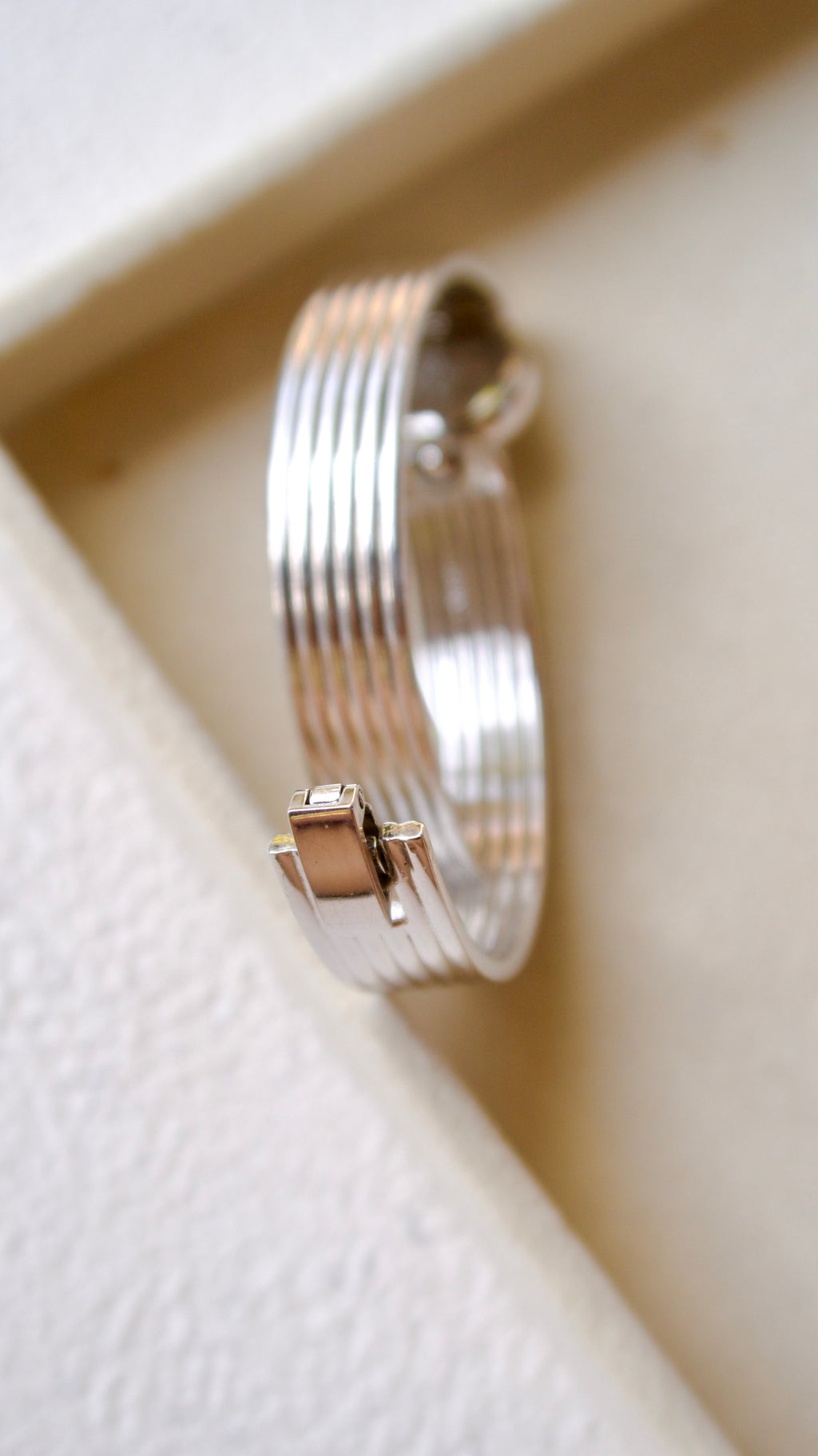 S. Round Dial Silver Bangle