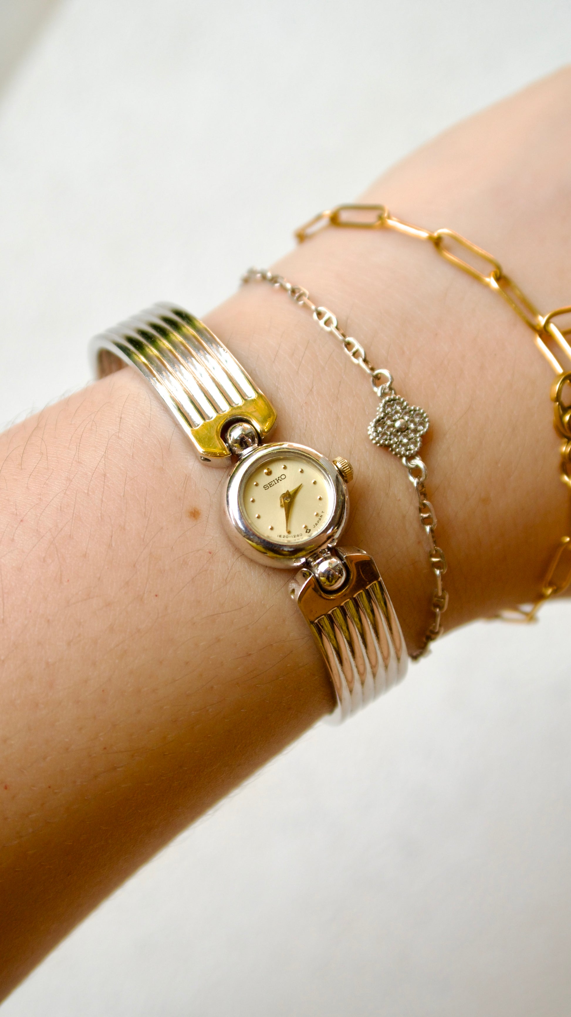 S. Round Dial Silver Bangle