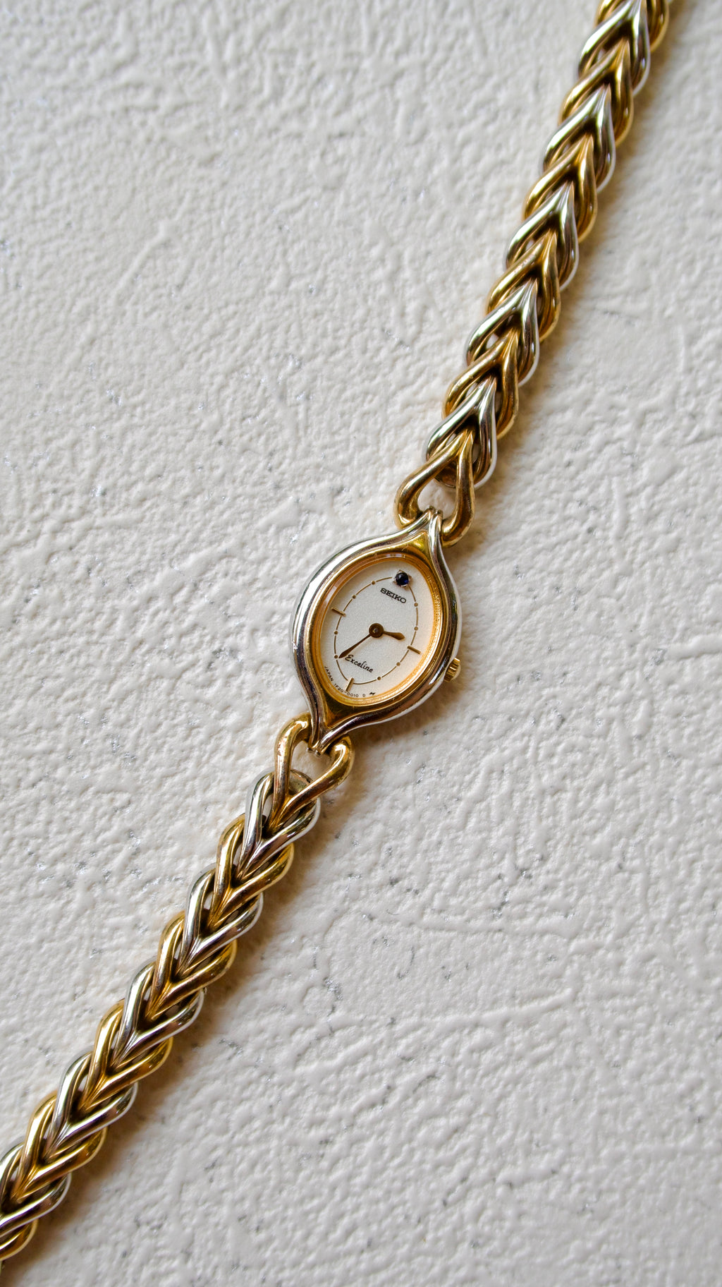 S. Exceline Black Jewel Oval Dial with Two Tone Braided Chain
