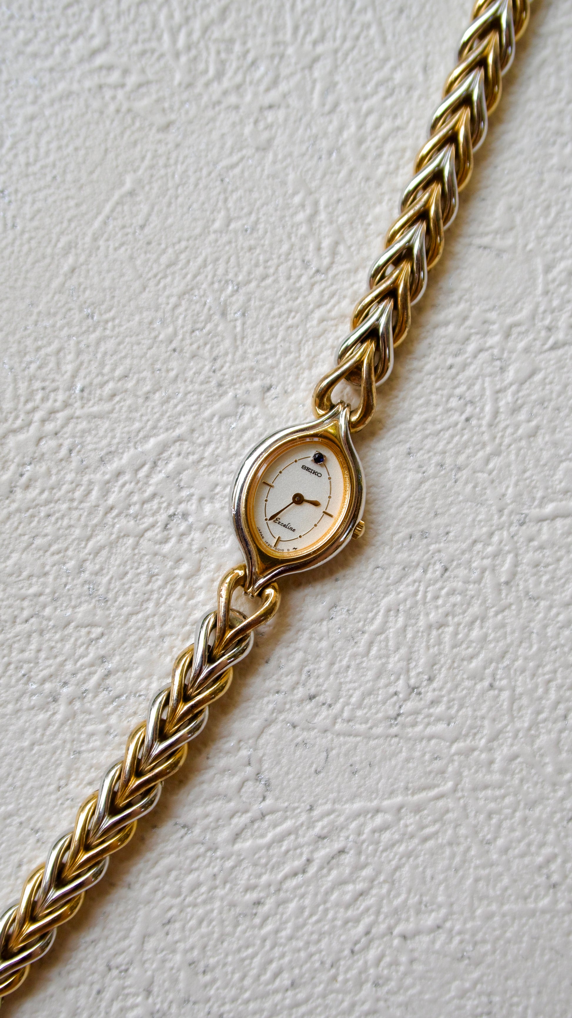 S. Exceline Black Jewel Oval Dial with Two Tone Braided Chain