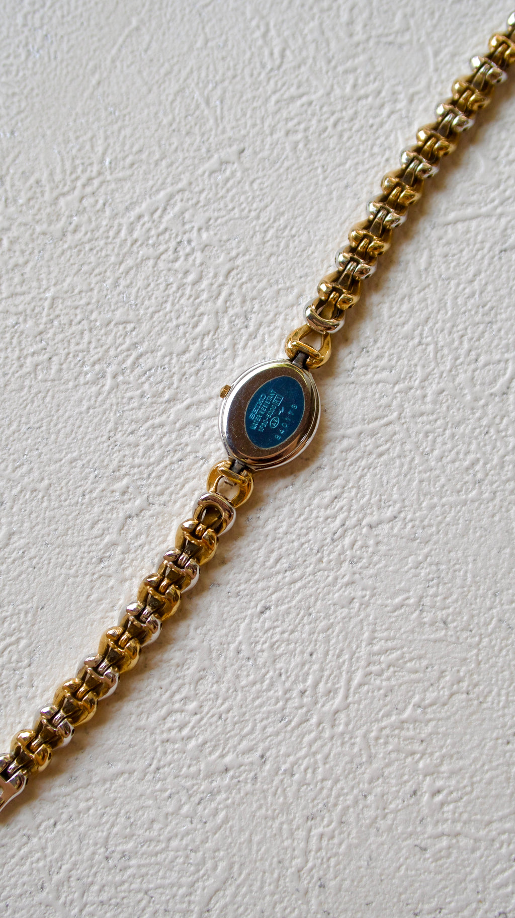 S. Exceline Black Jewel Oval Dial with Two Tone Braided Chain