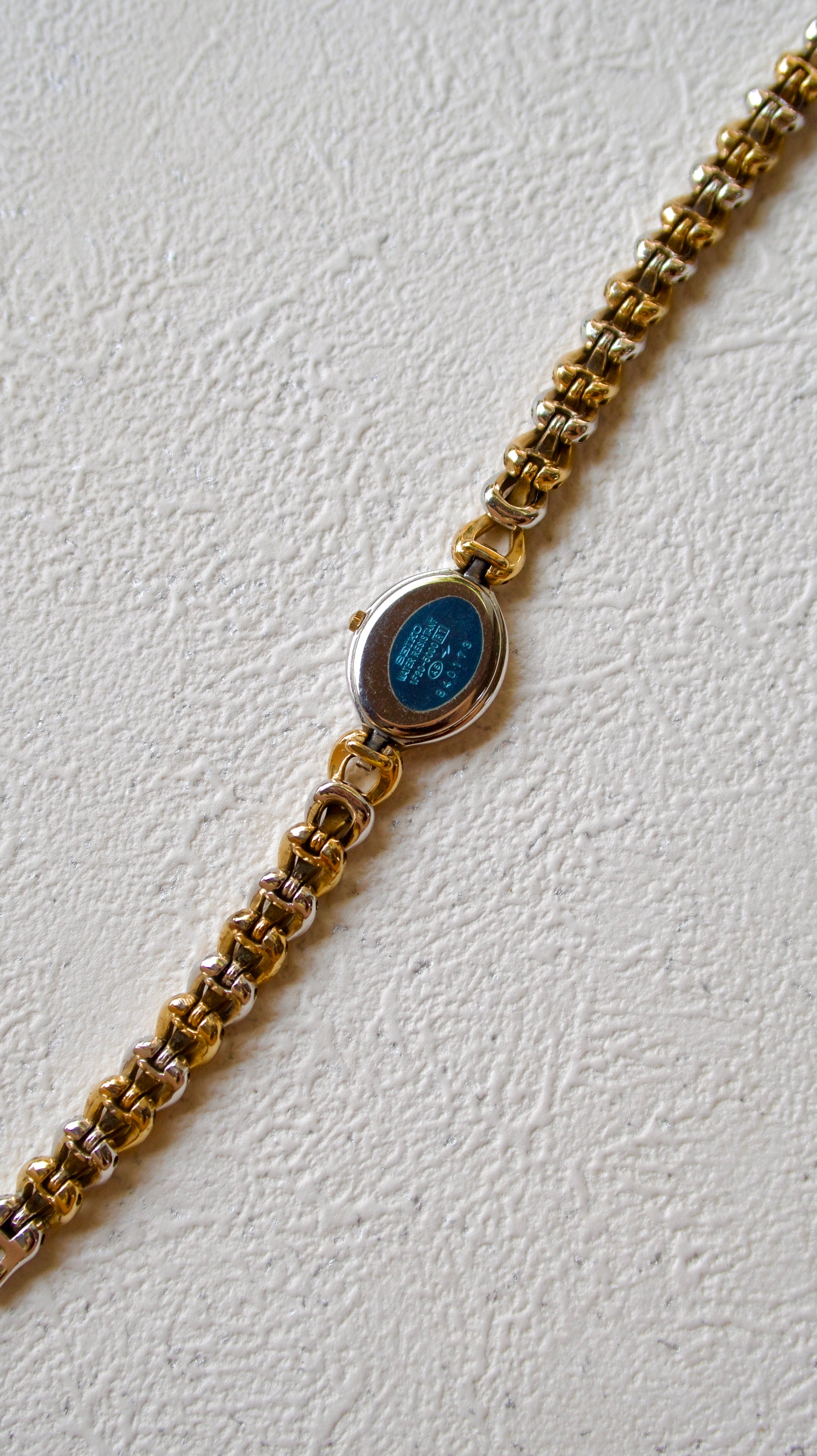 S. Exceline Black Jewel Oval Dial with Two Tone Braided Chain