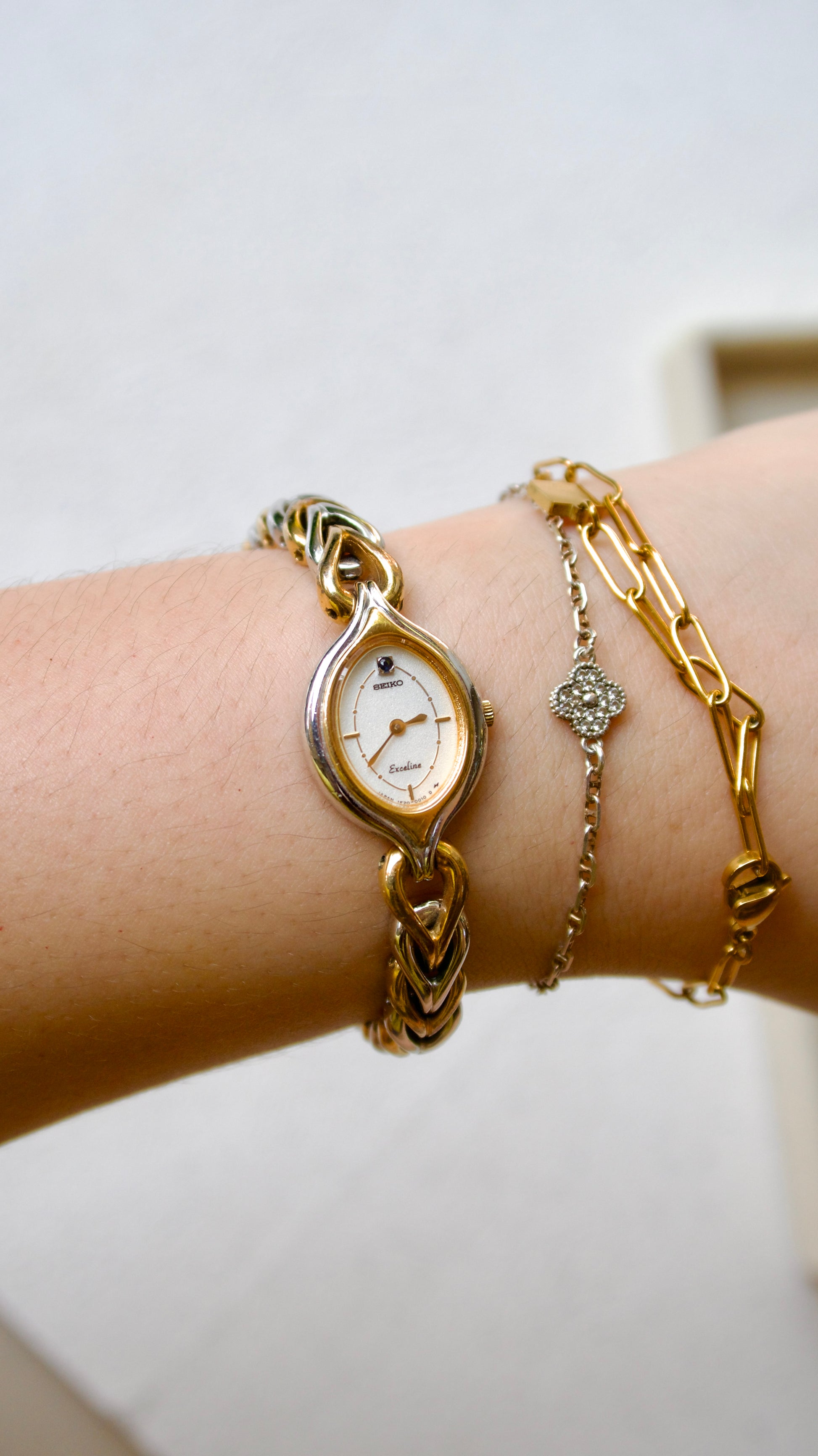 S. Exceline Black Jewel Oval Dial with Two Tone Braided Chain