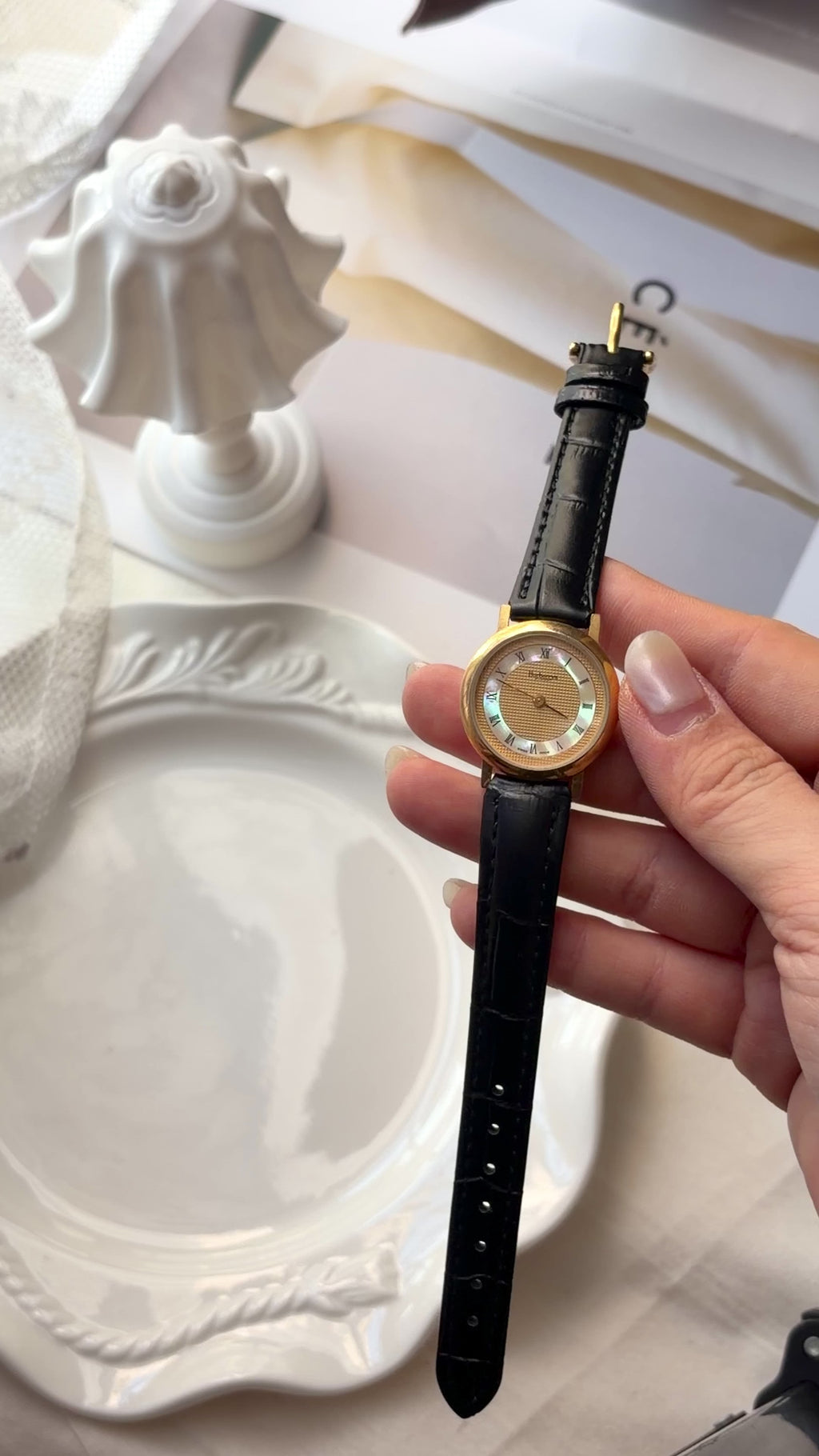 BRBY. Gold & MOP Round Dial Black Strap Watch