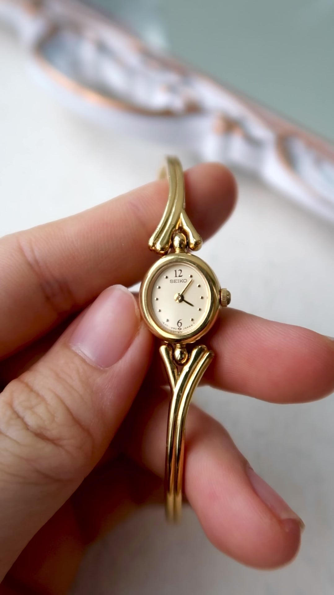 S. Round Gold Dial with Gold Bangle Bracelet