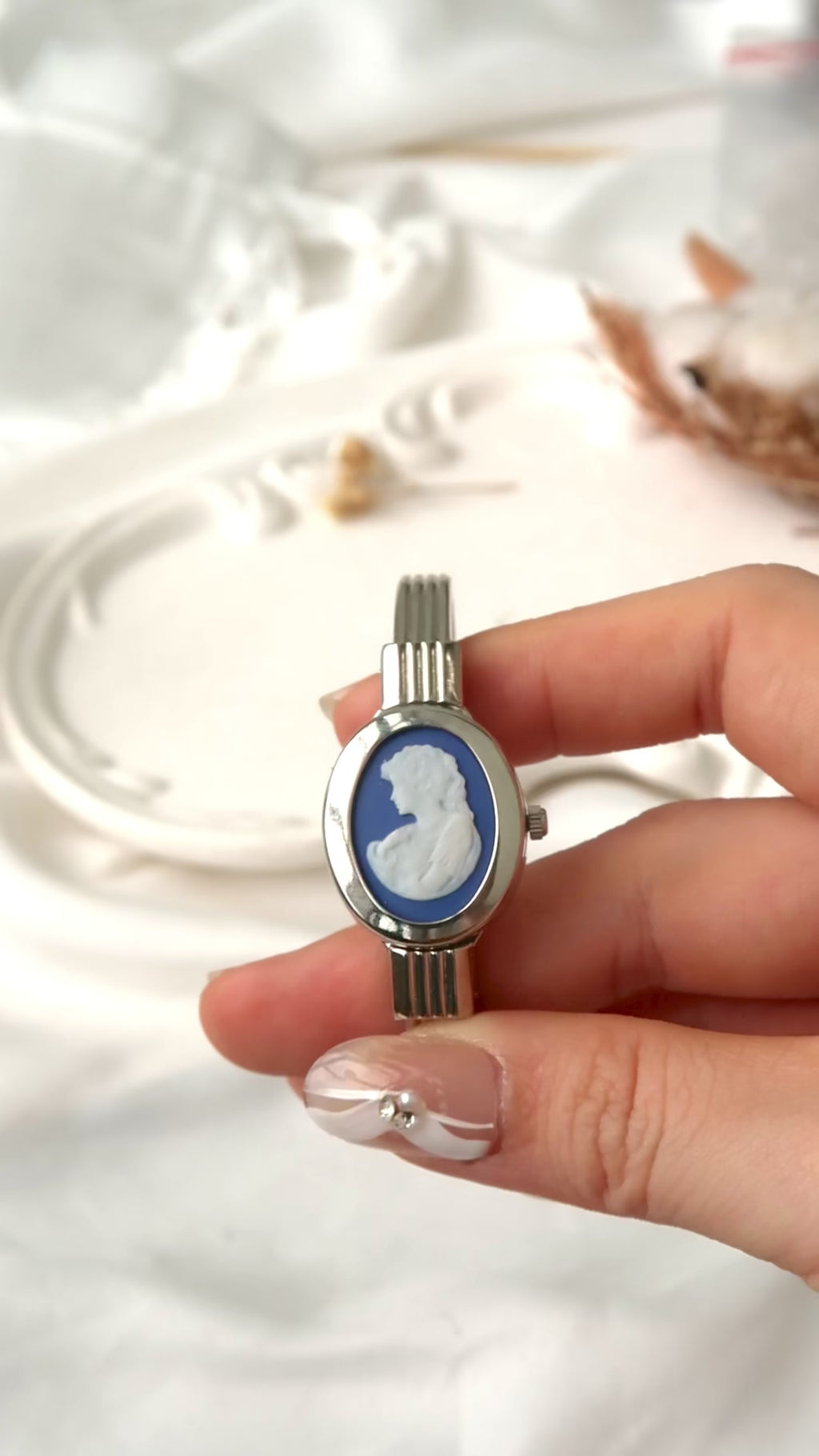 A.M. White Blue Sculpture Silver Bangle Watch