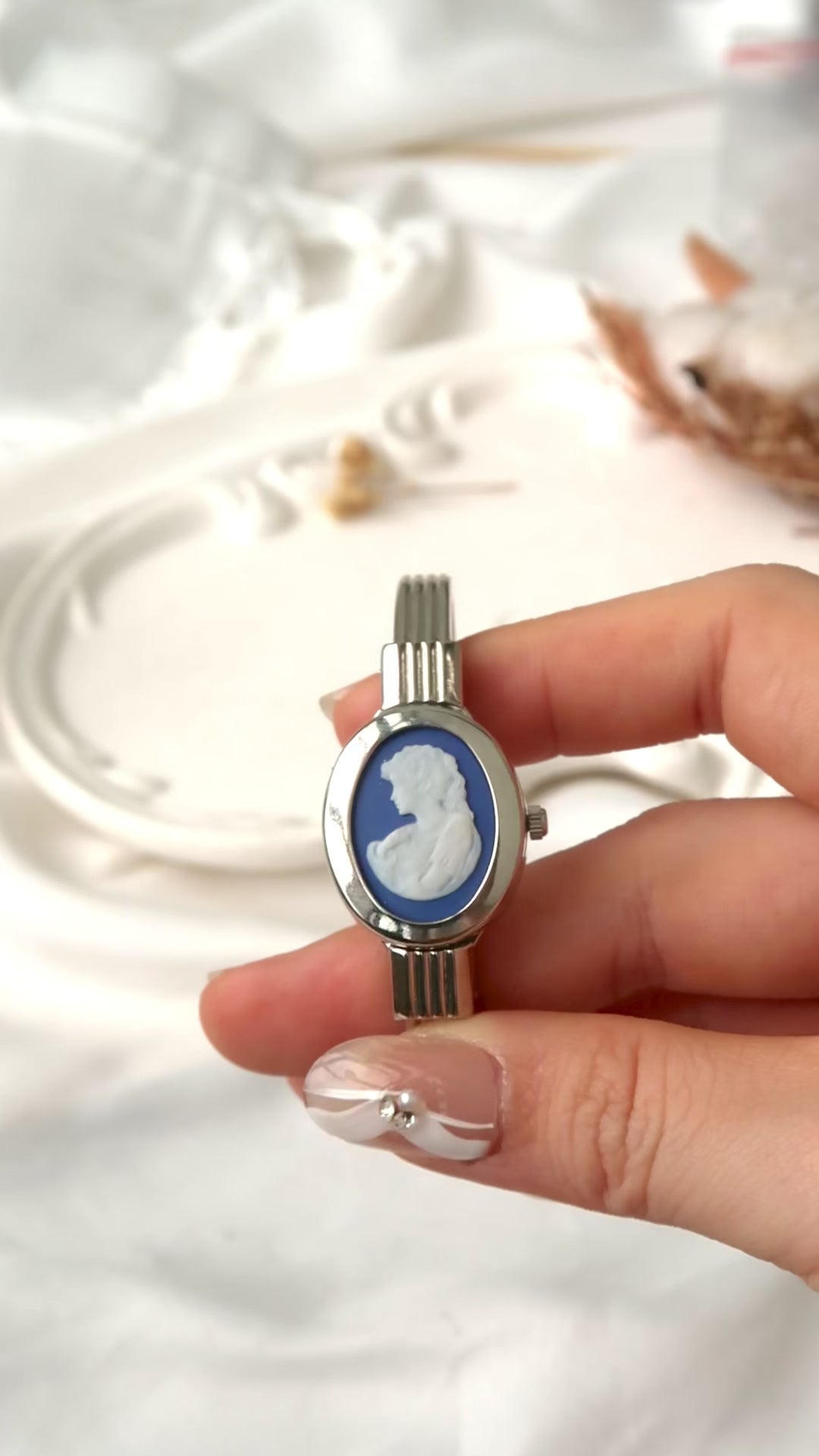 A.M. White Blue Sculpture Silver Bangle Watch