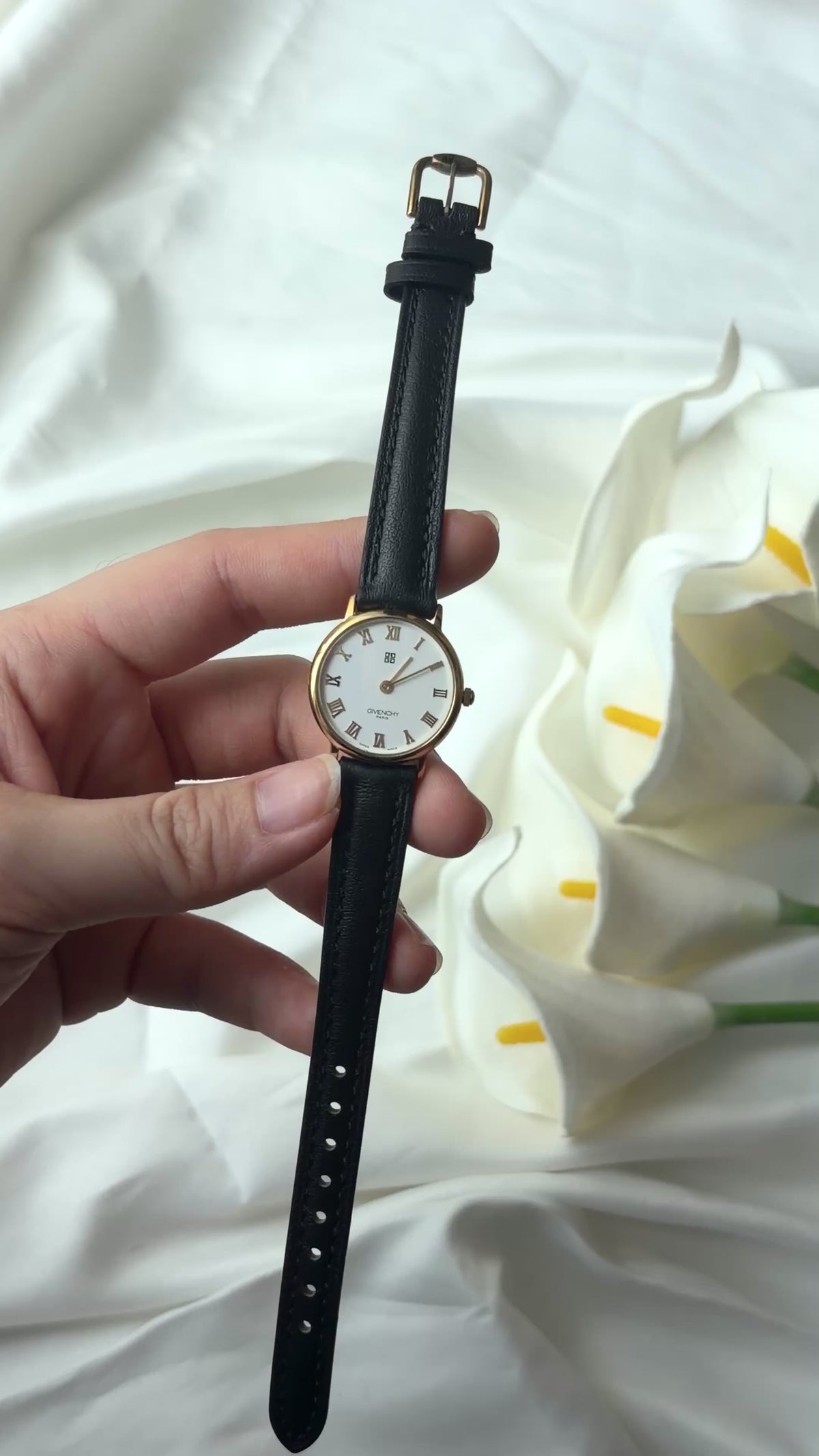 GV. White Round Roman Dial Black Strap Watch
