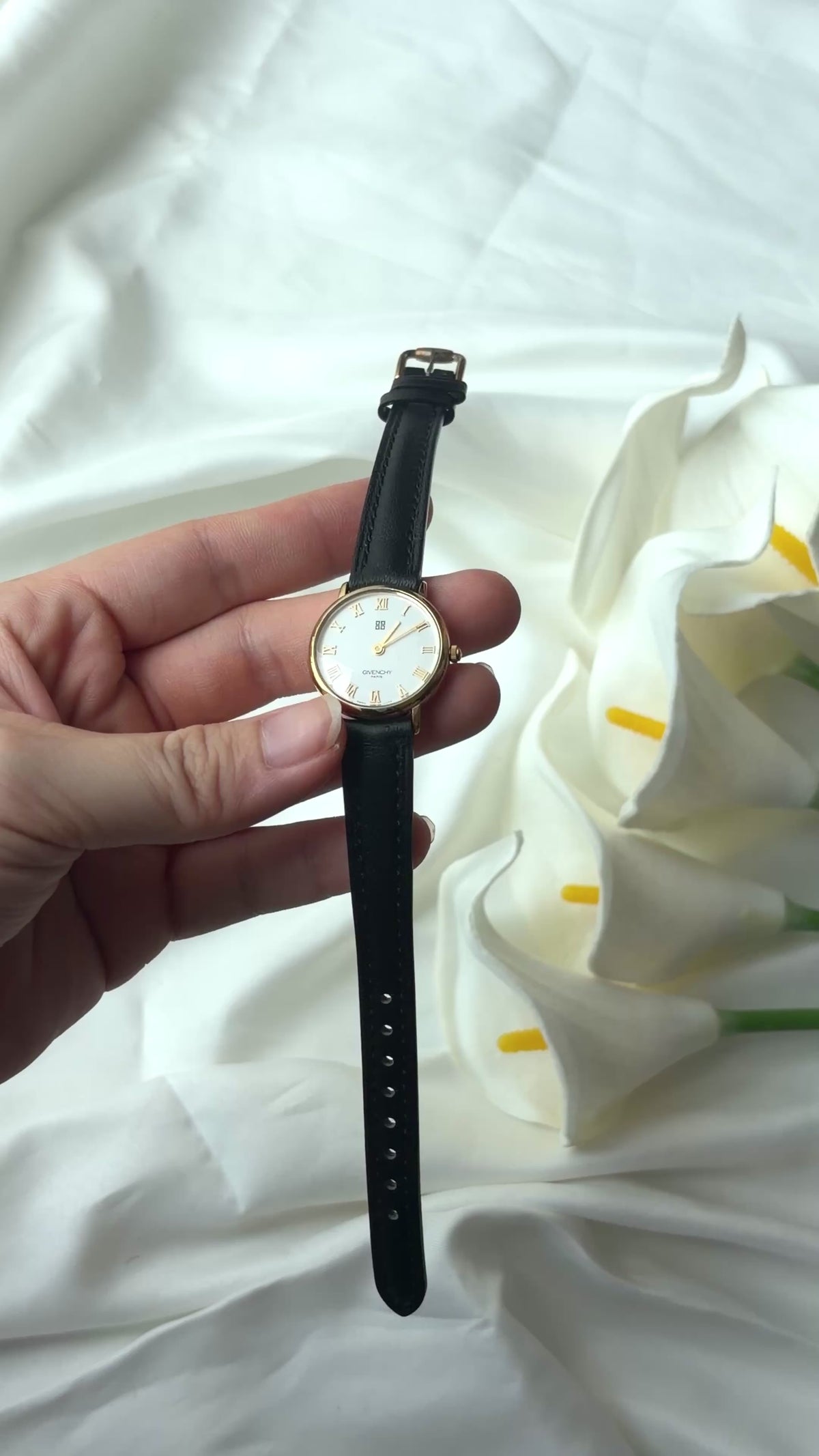 GV. White Round Roman Dial Black Strap Watch