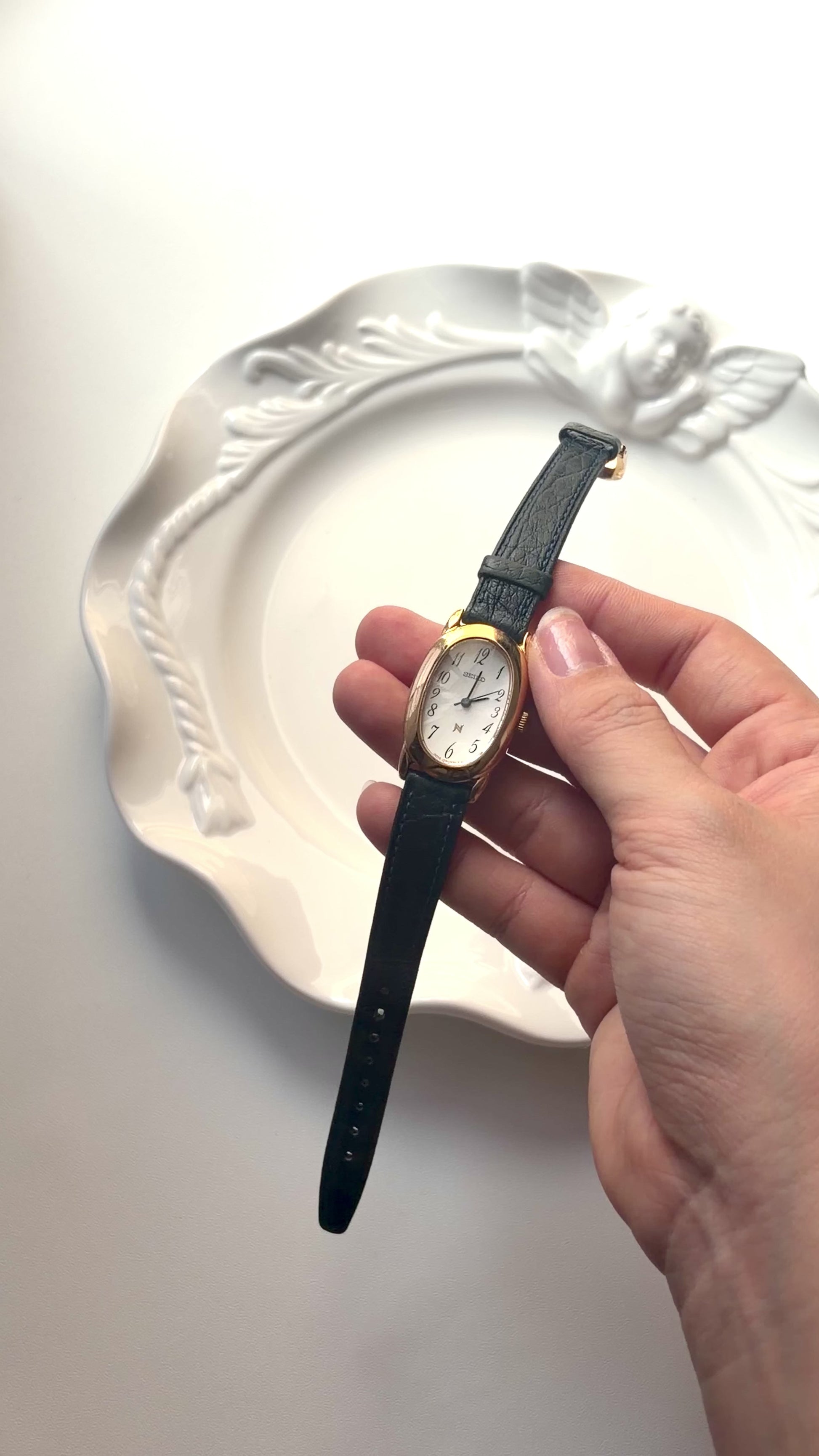 S. Noie White Oval Dial Black Strap Watch