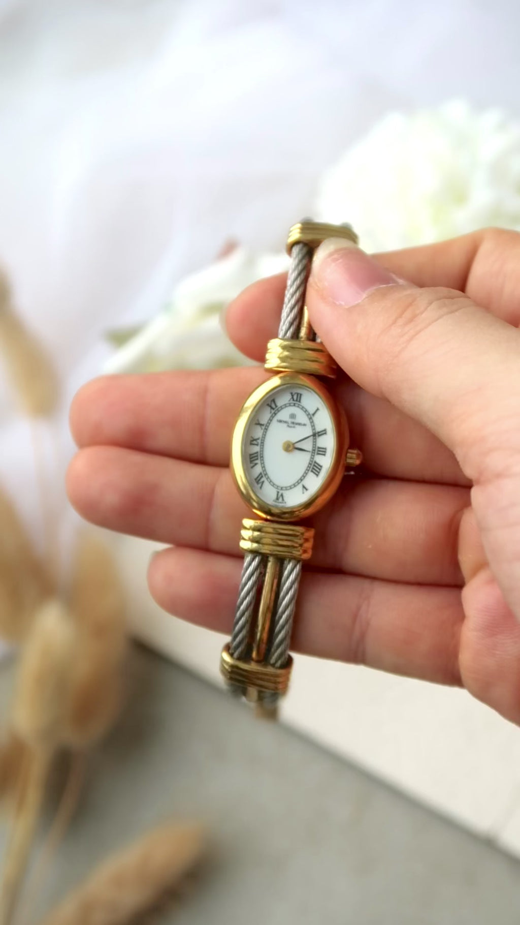 M. Herbelin White Oval Roman Dial with Two Tone Bangle Watch