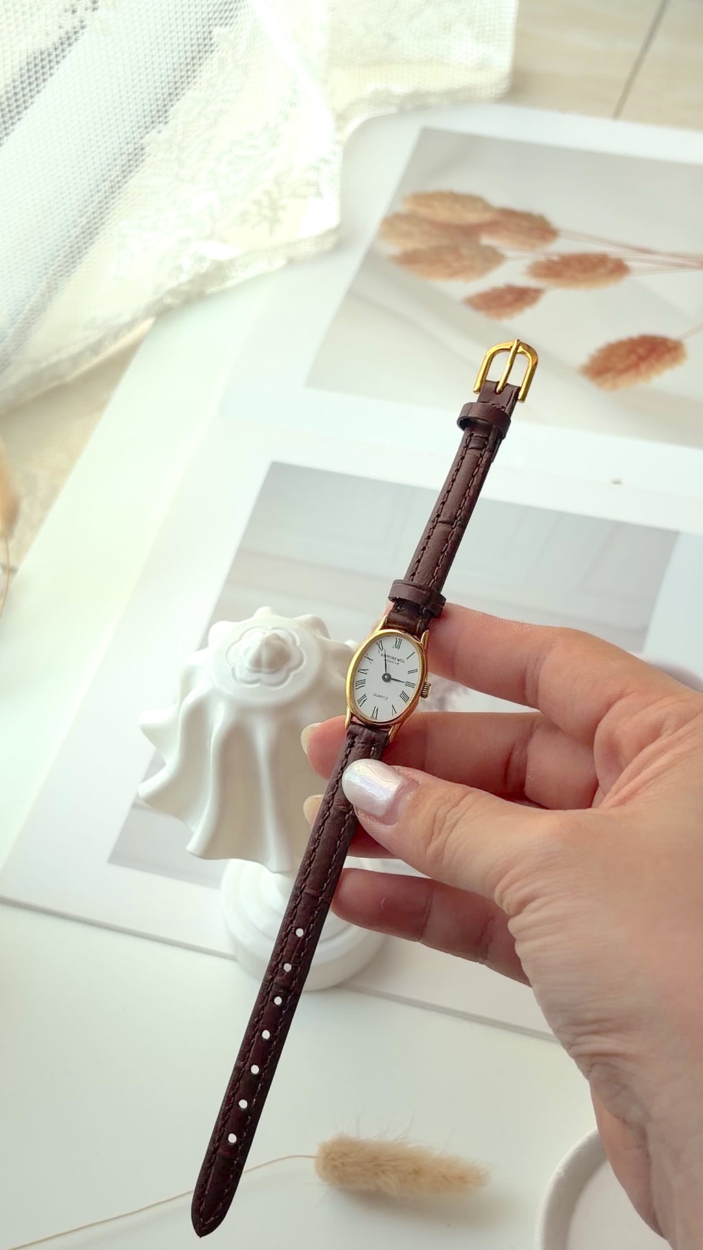 RW. White Oval Dial Brown Strap Watch