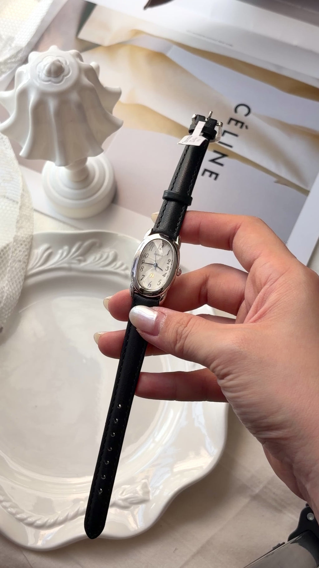 S. Noie White Oval Dial Black Strap Watch